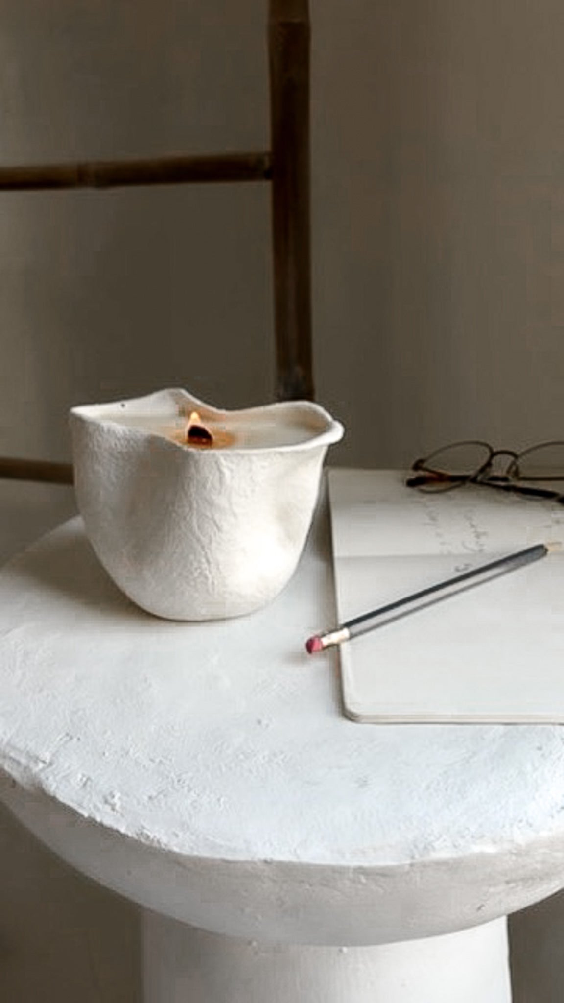 Handmade ceramic soy candle in a pinched vessel, a housewarming gift