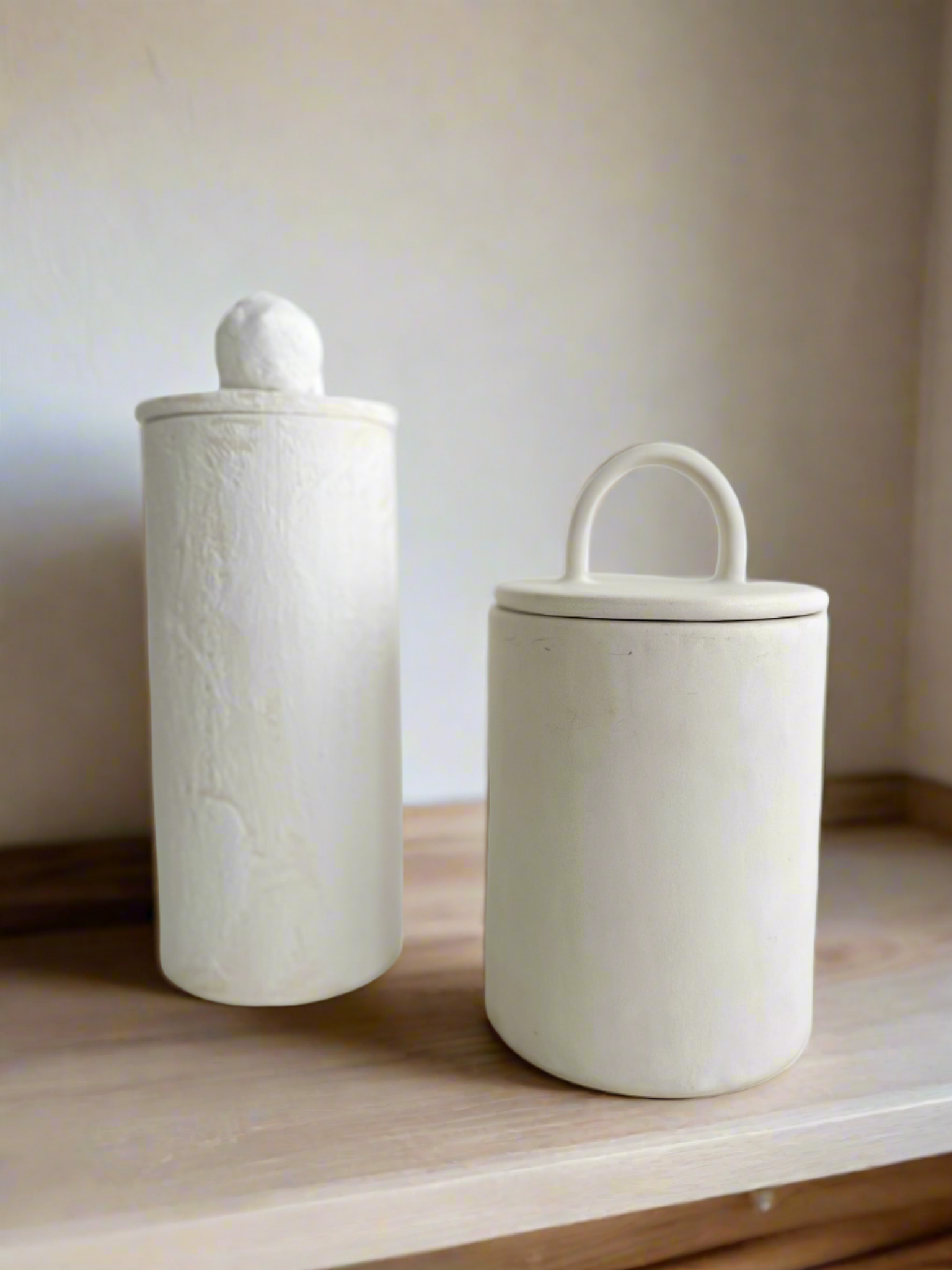 Handmade ceramic storage canisters and lidded jars by Muddy Heart