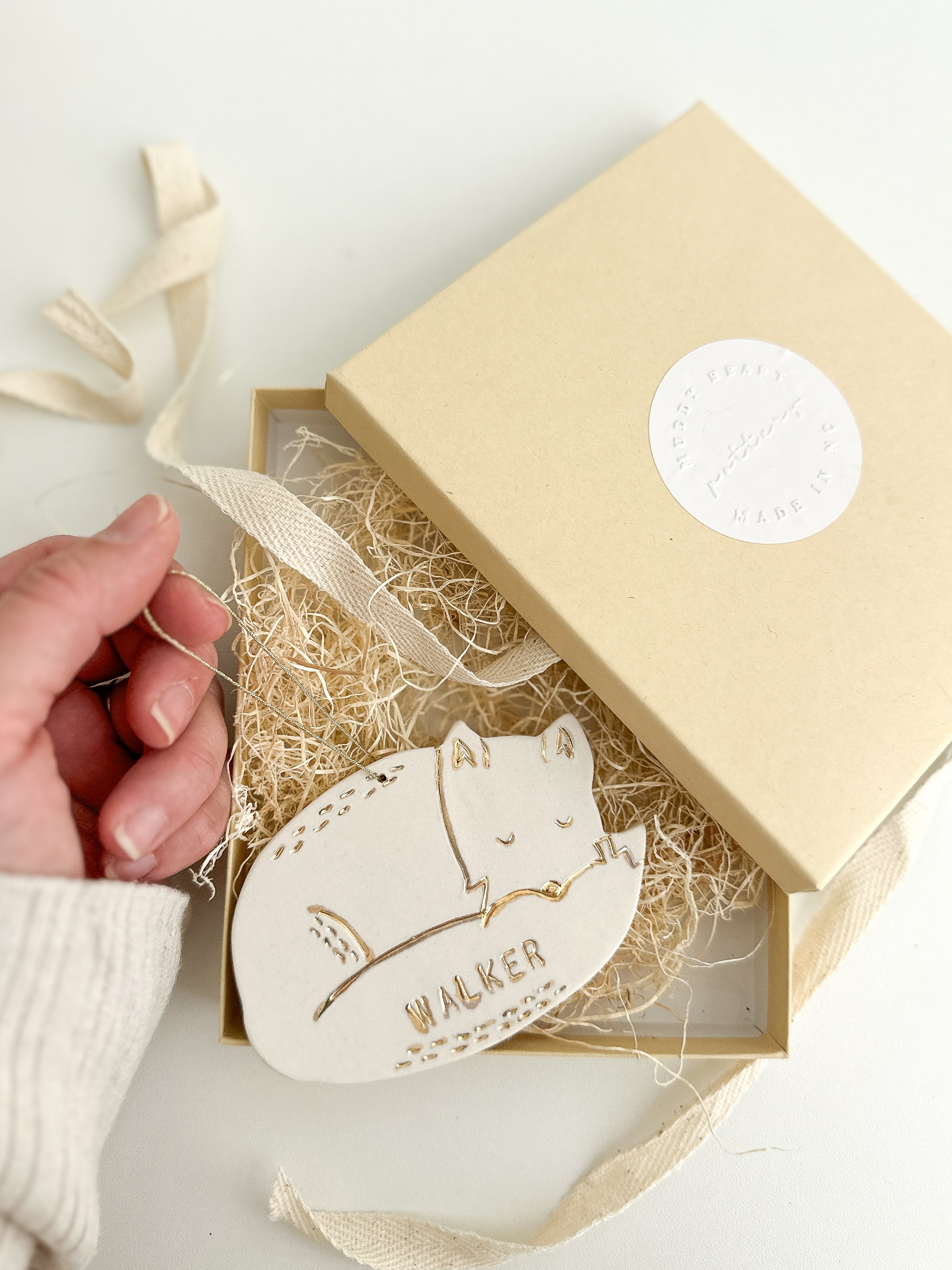 Handmade ceramic ornaments and personalized keepsakes by Muddy Heart