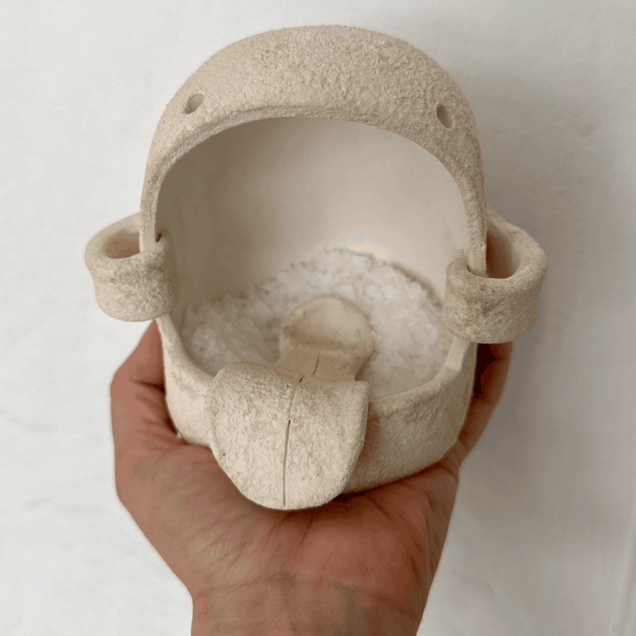 Handmade ceramic monster figures and salt pigs by Muddy Heart