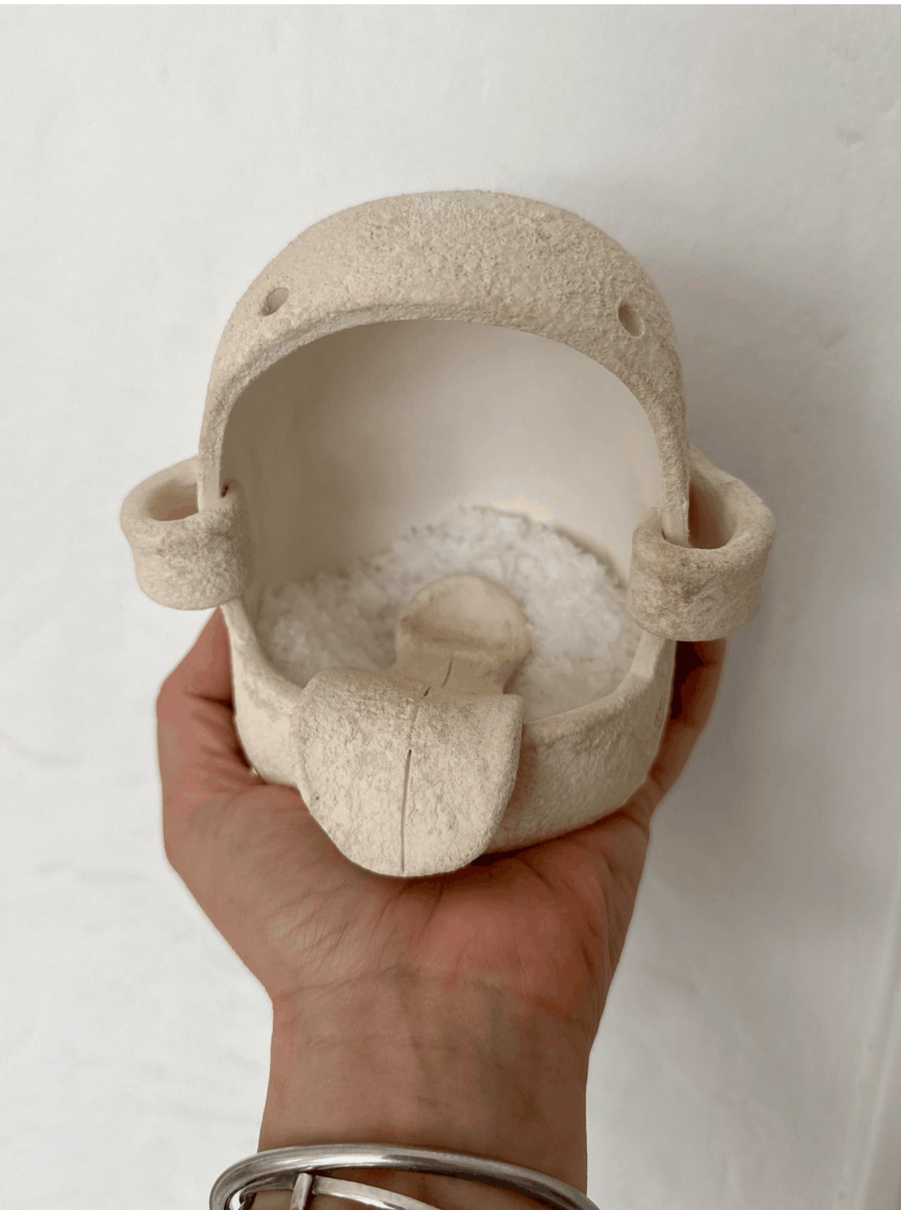 Handmade ceramic monster figures and salt pigs by Muddy Heart