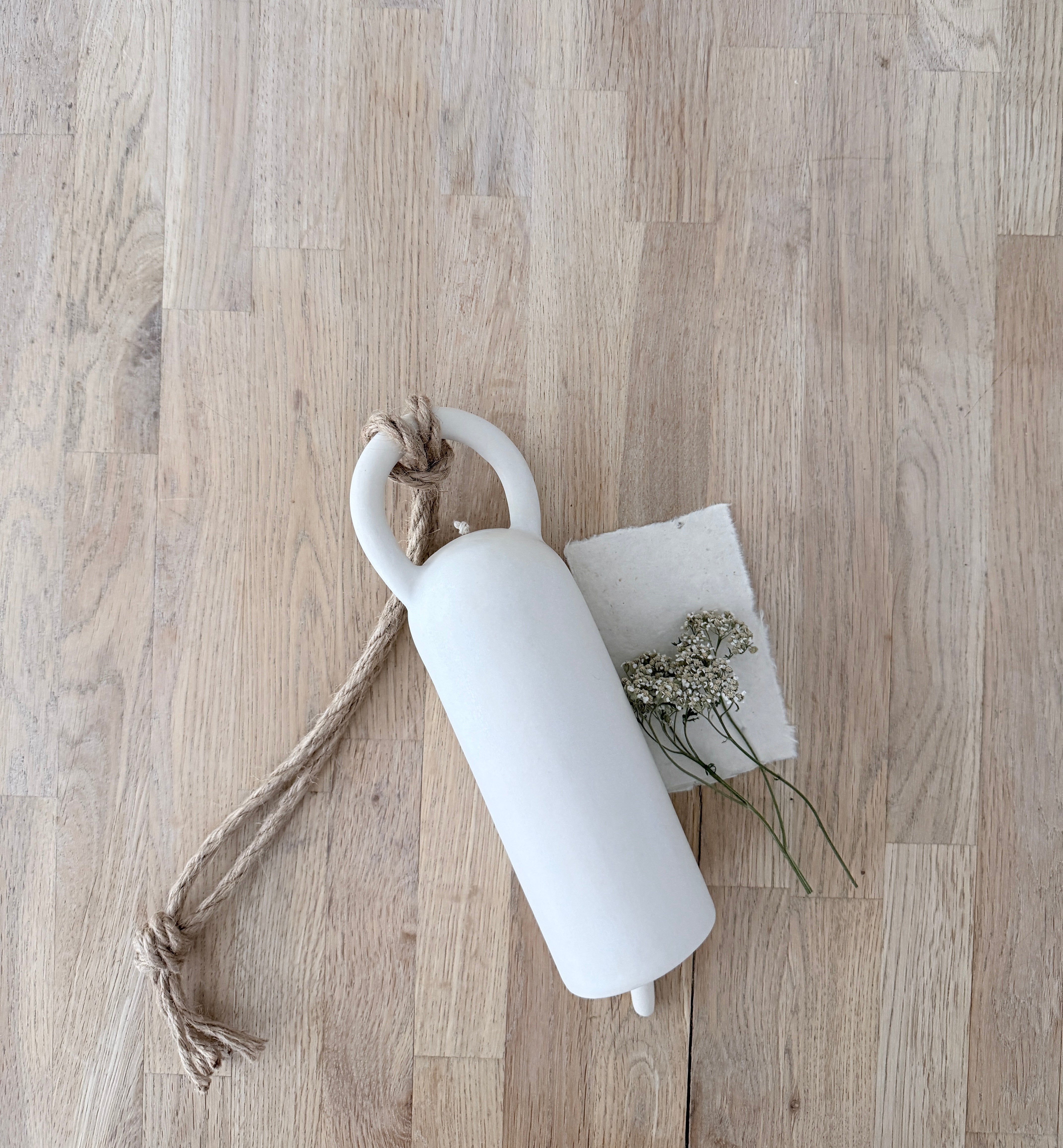 Handmade round-handled ceramic bell with cotton rope and stoneware knocker