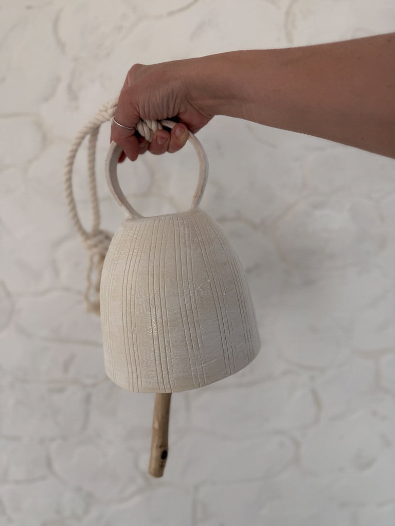 Handmade ceramic wish bell in a neutral, earthy finish