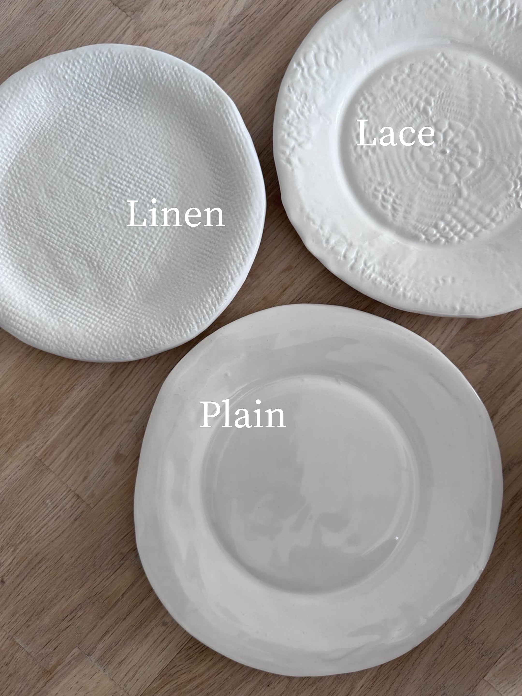 Neutral ceramic dinnerware with lace texture and raw-shaped edges