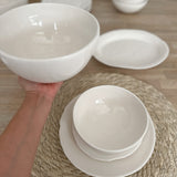 Handmade stoneware small dish with a raw-shaped edge