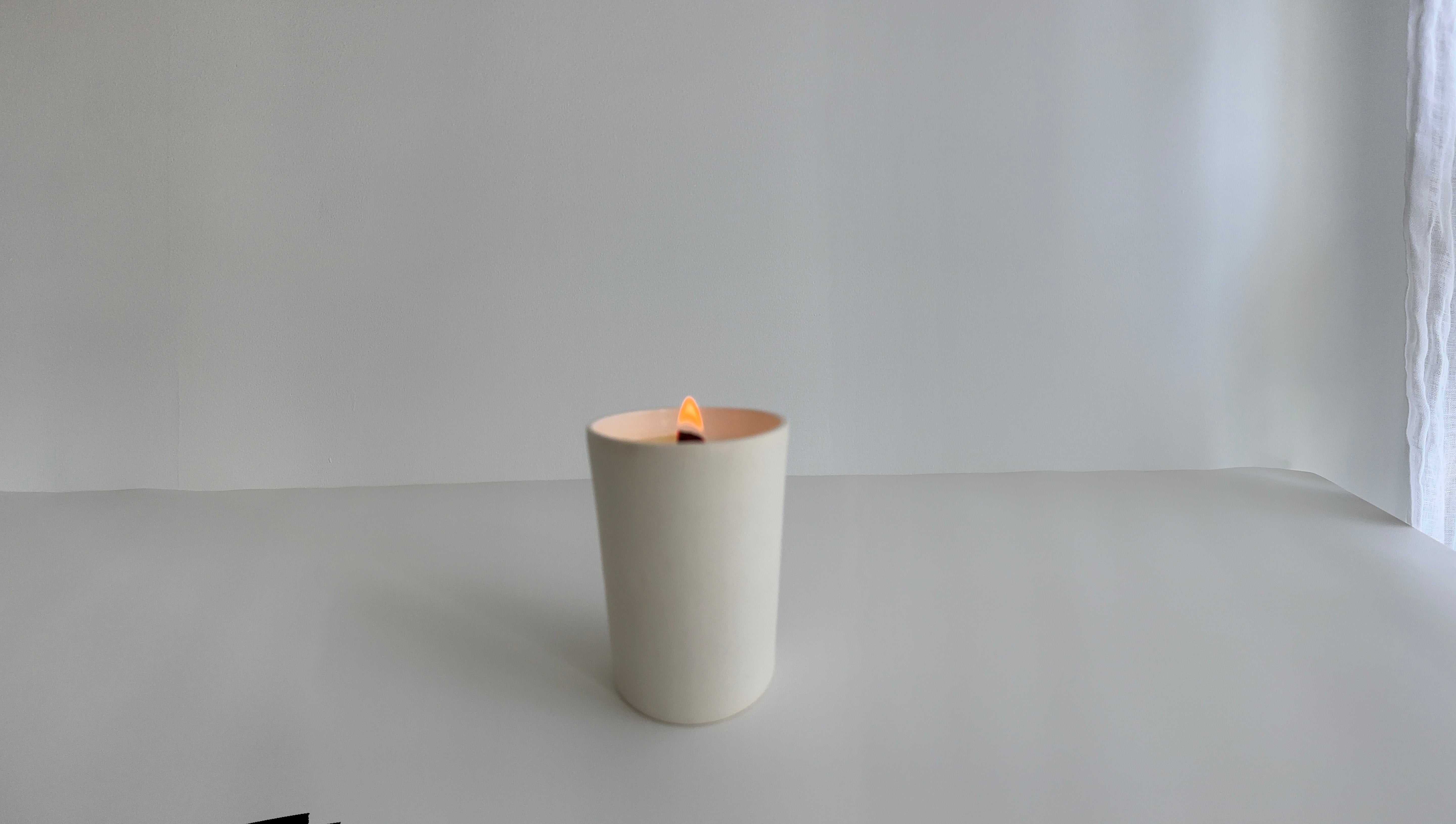 Ceramic tumbler soy candle with a crackling wood wick