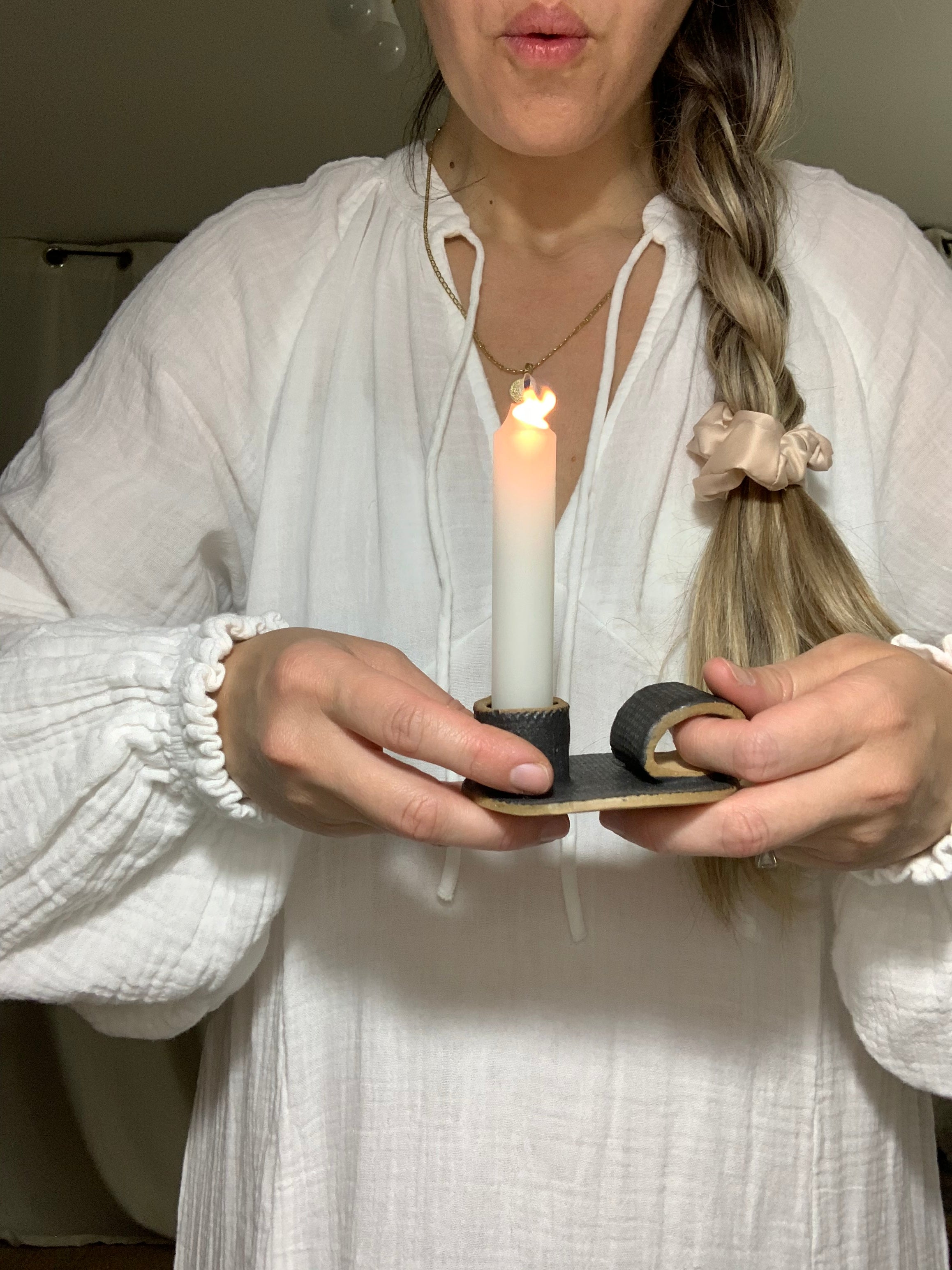 Handmade primitive ceramic taper candle holder in a neutral glaze