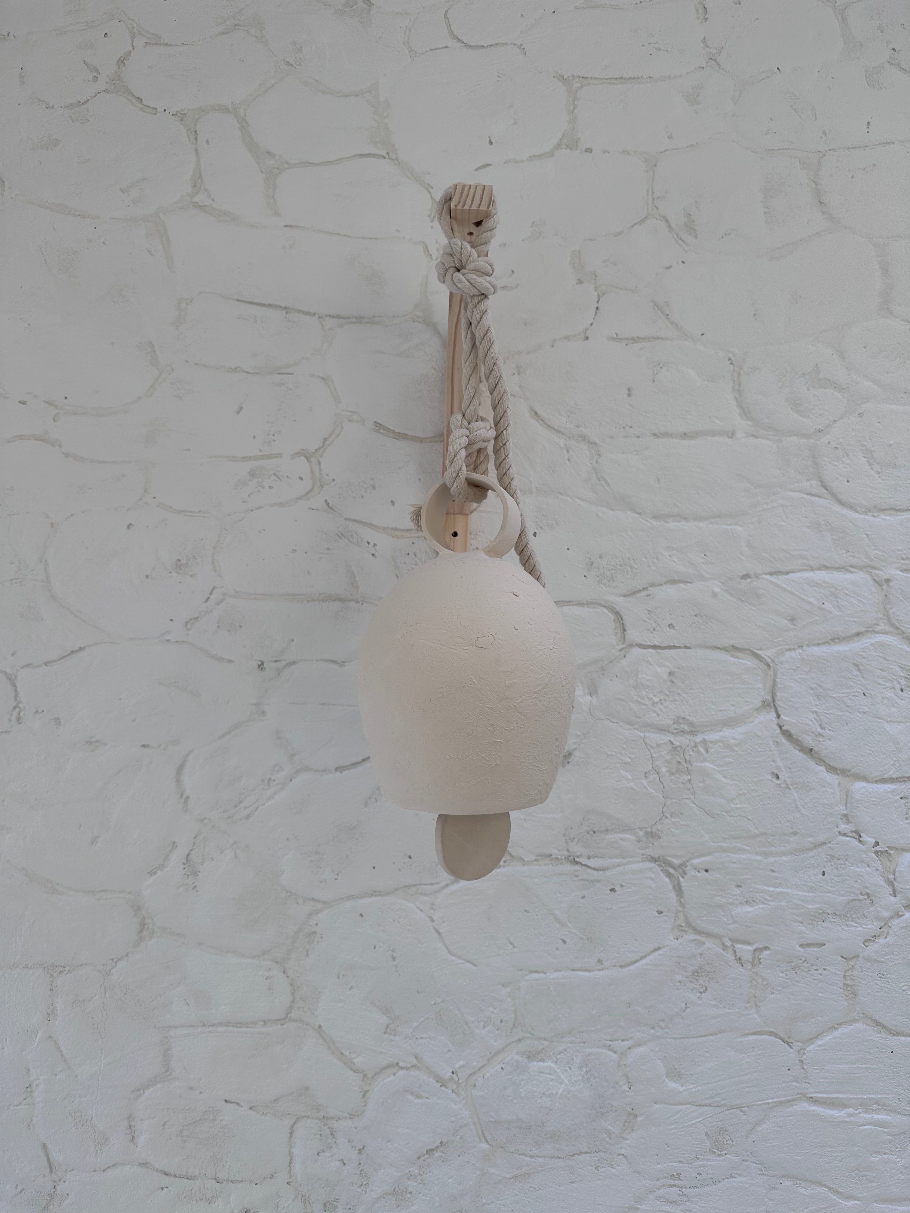 Handmade large round-handle ceramic bell with thick cotton rope
