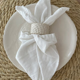 Handmade lace-textured white stoneware dinnerware set