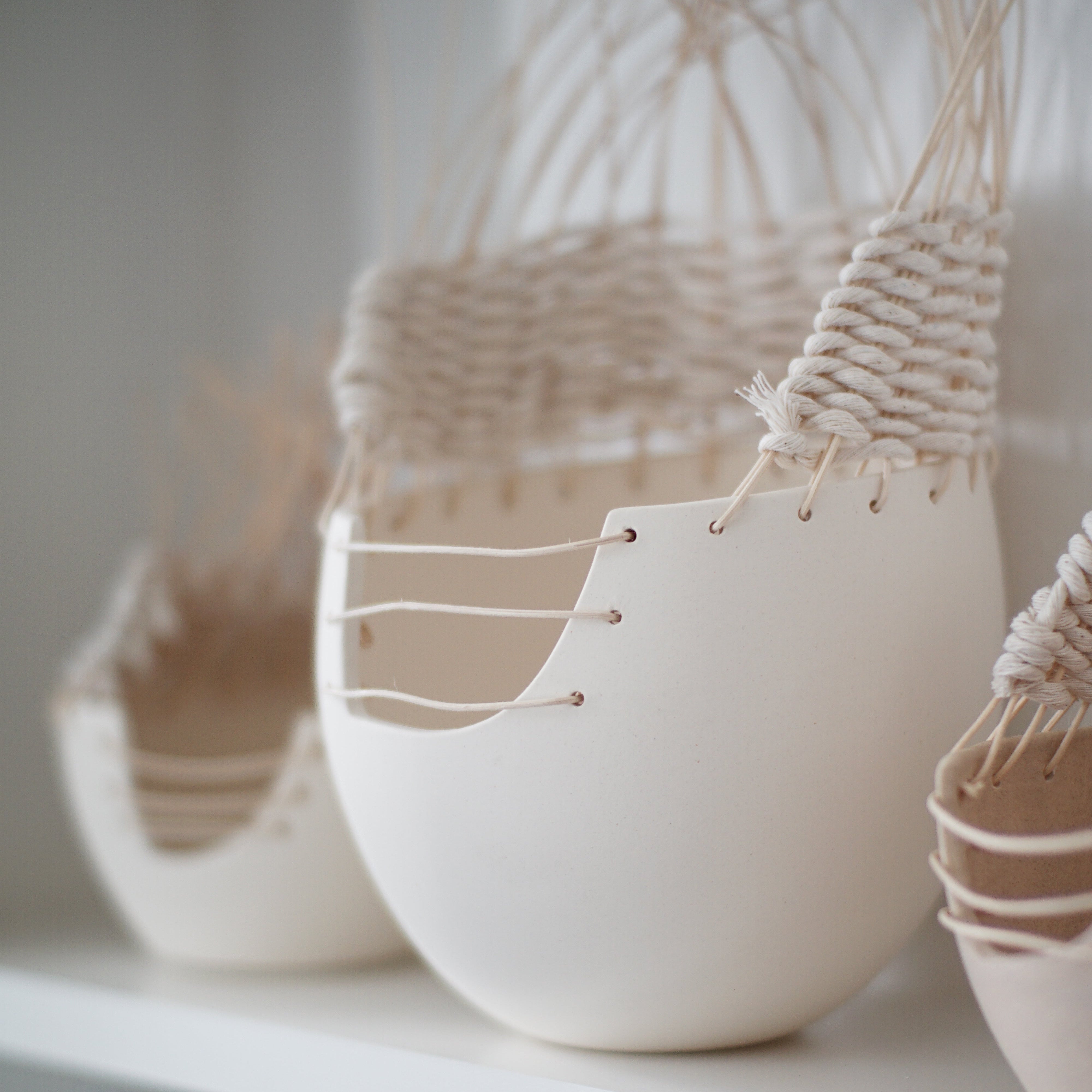 Handmade woven ceramic pottery basket by Muddy Heart