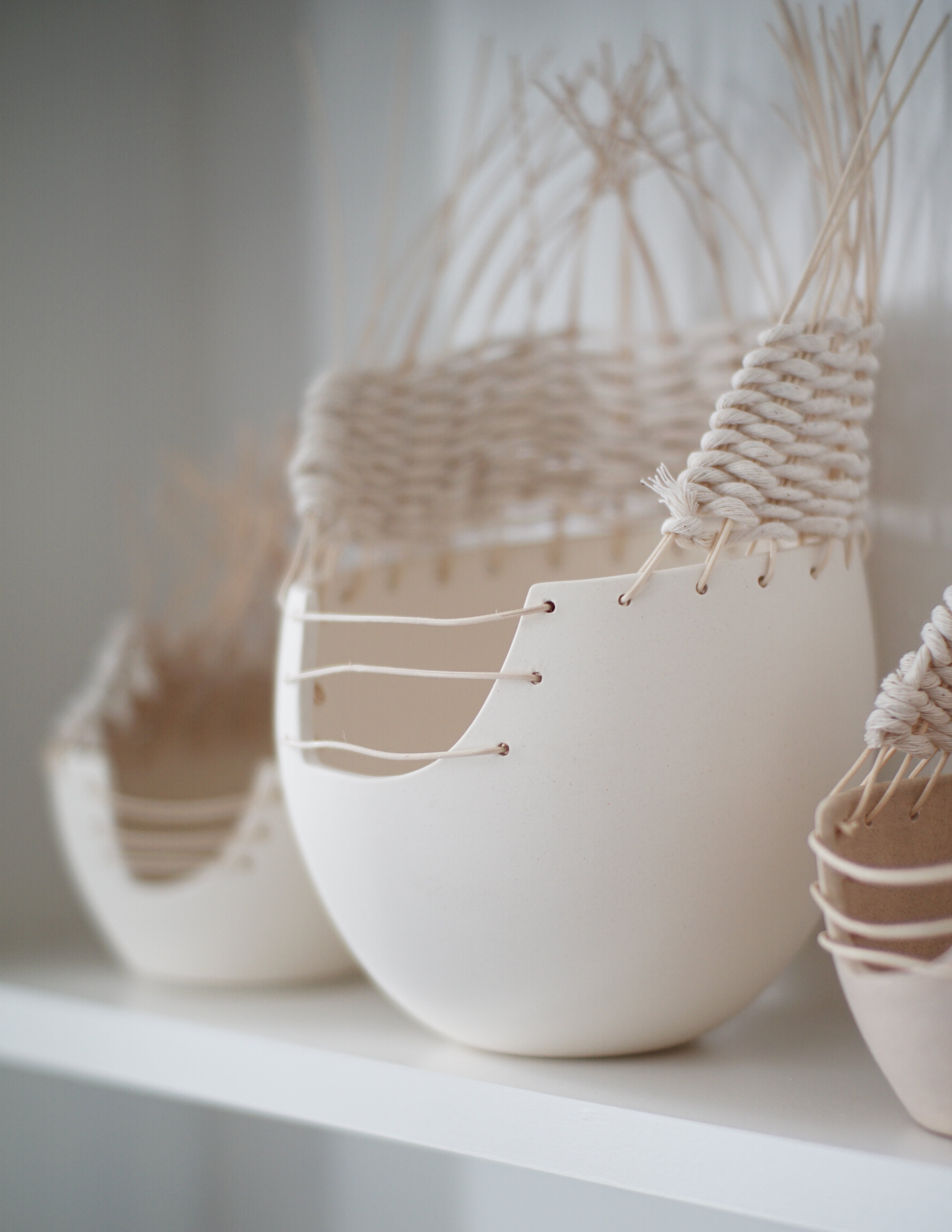 Handmade woven ceramic pottery basket by Muddy Heart