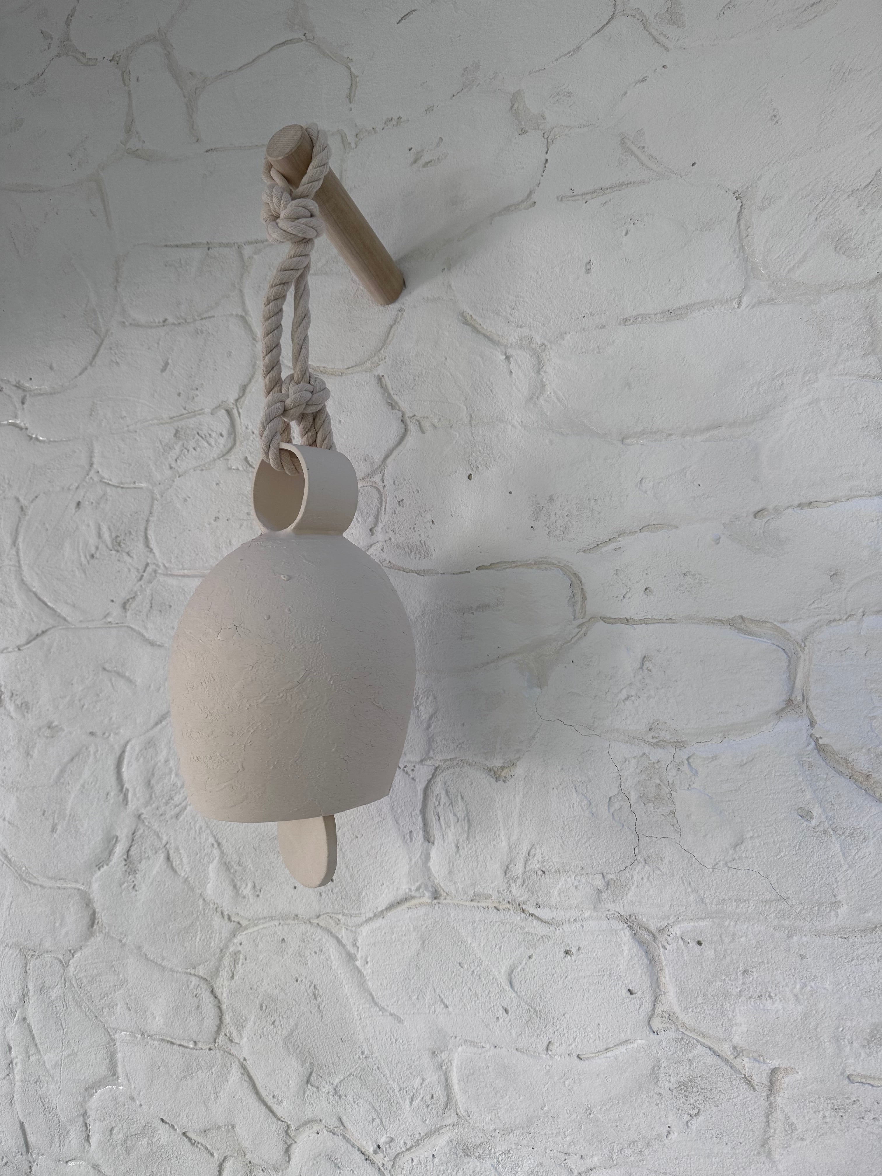 Handmade large round-handle ceramic bell with thick cotton rope
