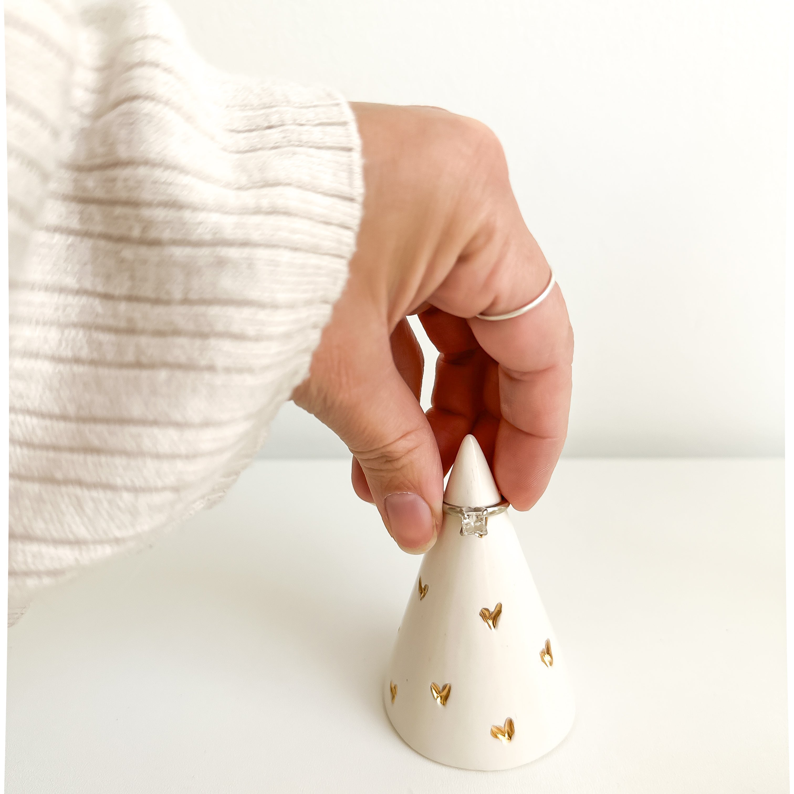Handmade ceramic ring cone carved with little hearts and gilded in real 22-karat gold