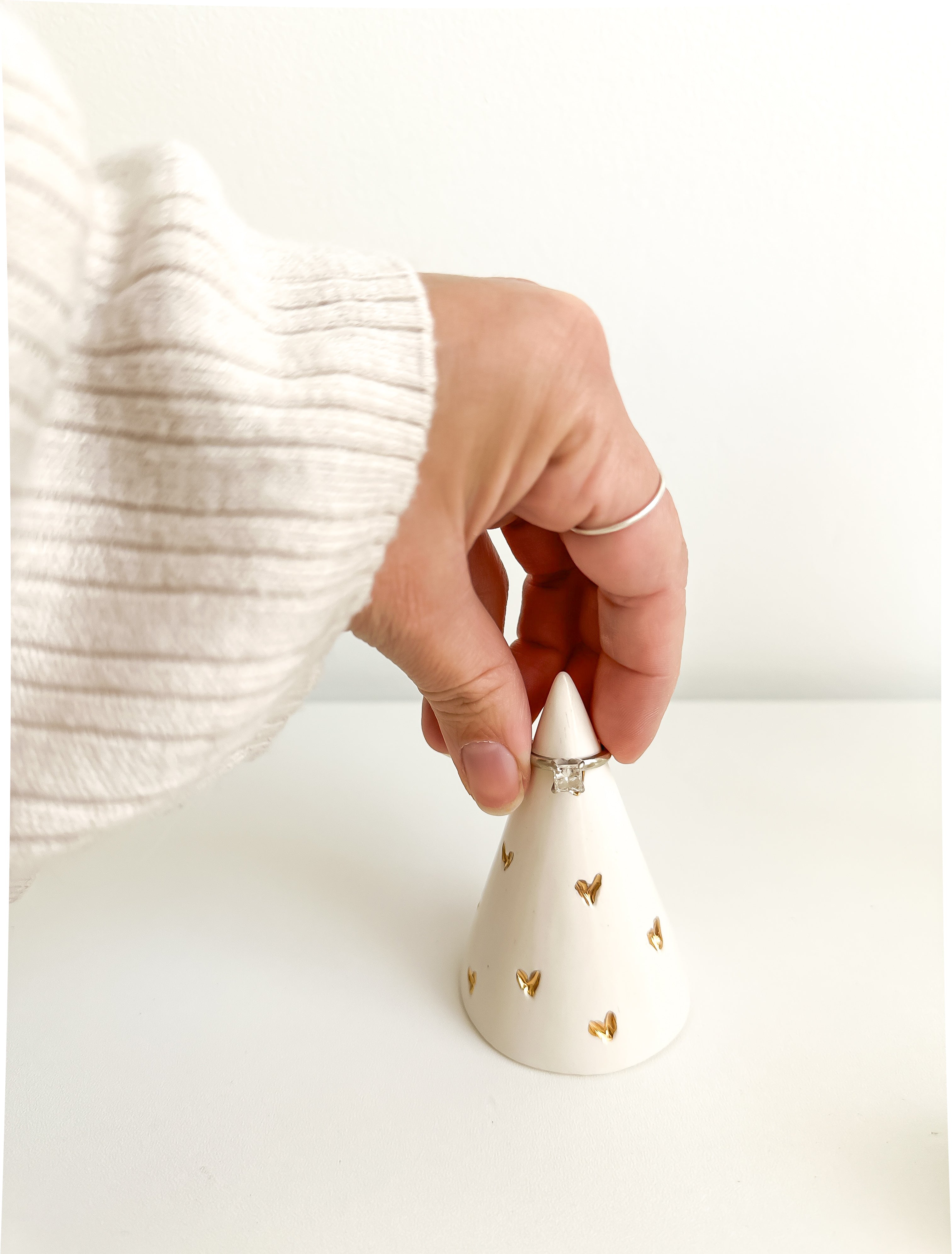 Handmade ceramic ring cone carved with little hearts and gilded in real 22-karat gold