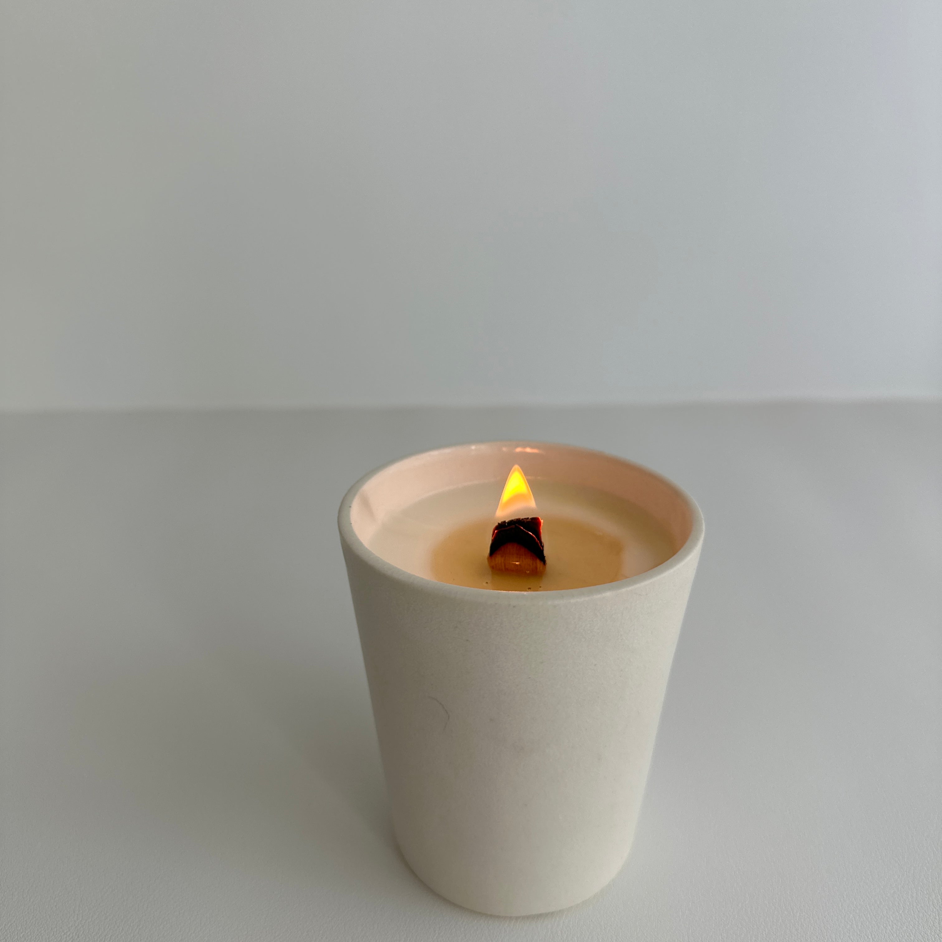 Handmade ceramic tumbler soy candle with carved star design