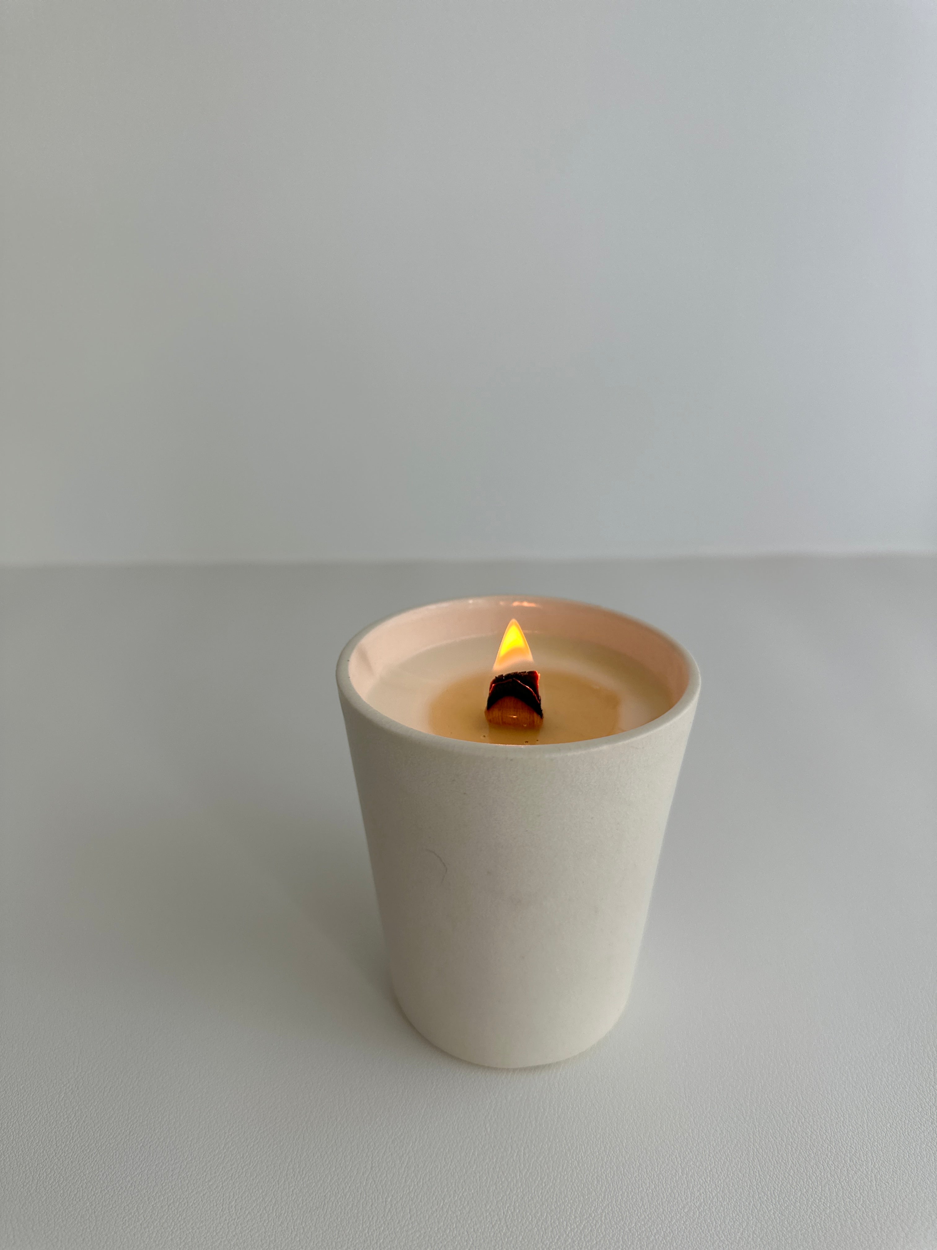 Handmade ceramic tumbler soy candle with carved star design