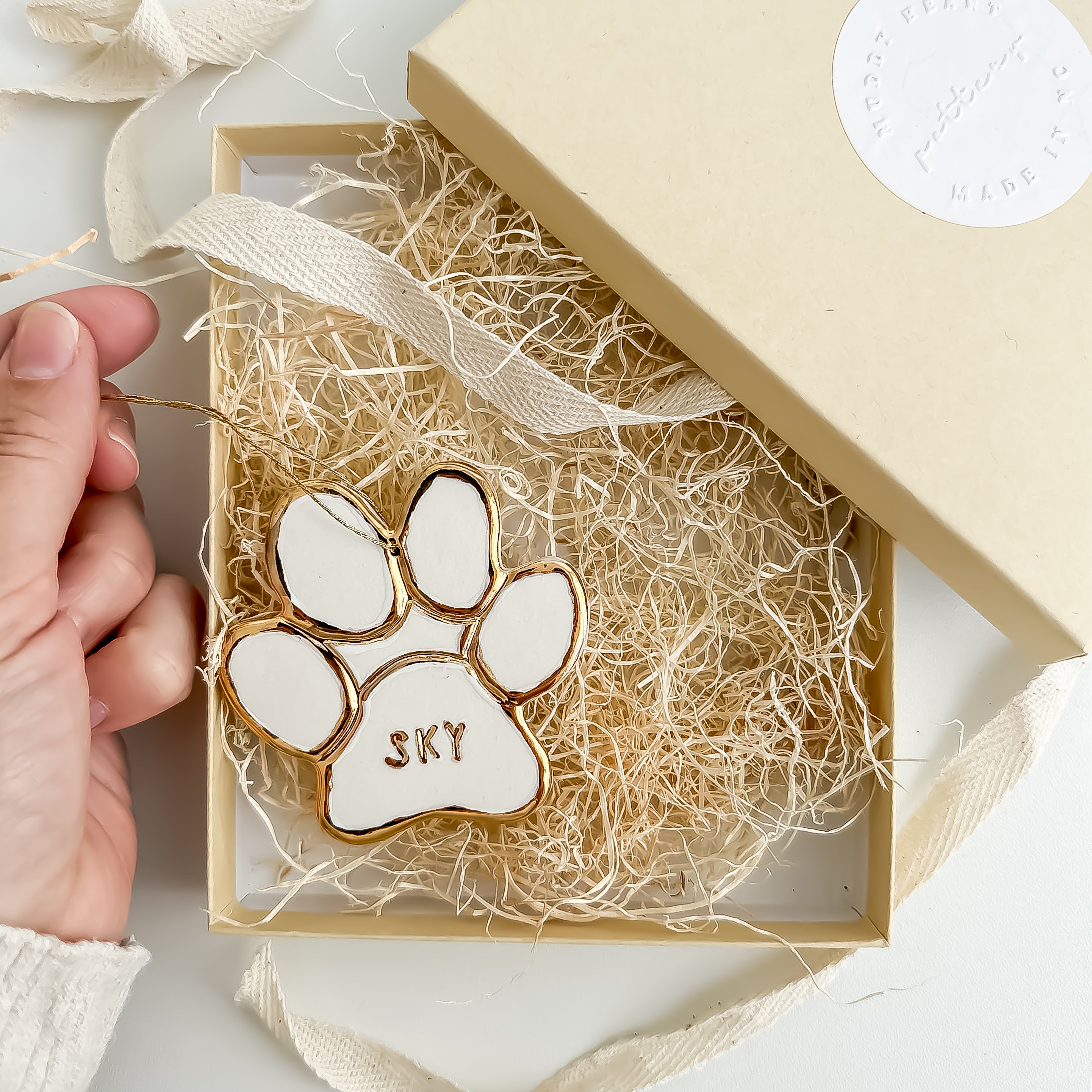 Handmade porcelain pet paw ornament with 22K gold luster by Muddy Heart