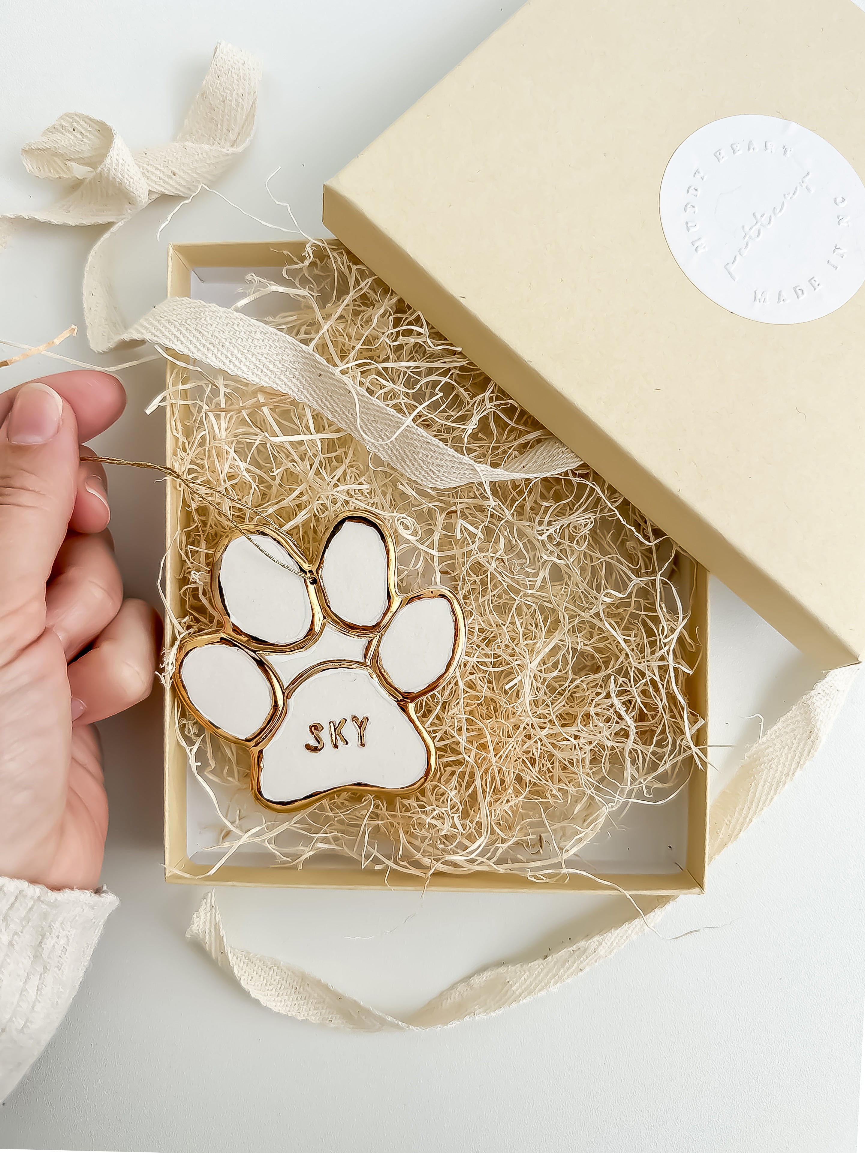 Handmade porcelain pet paw ornament with 22K gold luster by Muddy Heart
