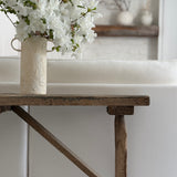 Handmade tall ceramic vessel with a handle for long-stemmed flowers