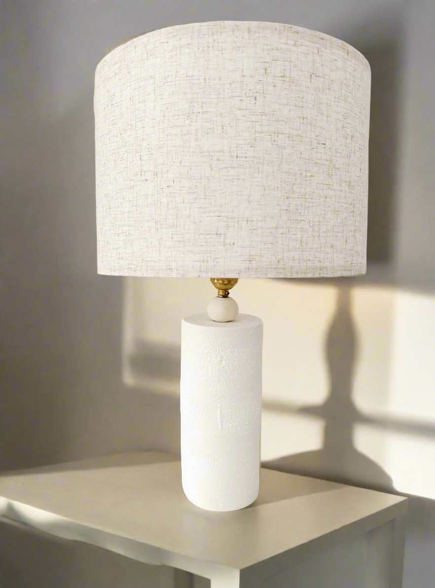 Sculptural ceramic table lamp for a calm, neutral room