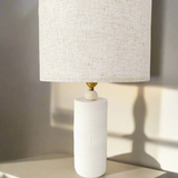 Sculptural ceramic table lamp for a calm, neutral room