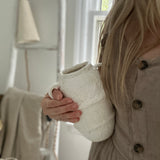 Neutral-toned ceramic vases with a rustic look