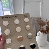 Set of ceramic color-chip tiles for comparing glaze shades and textures