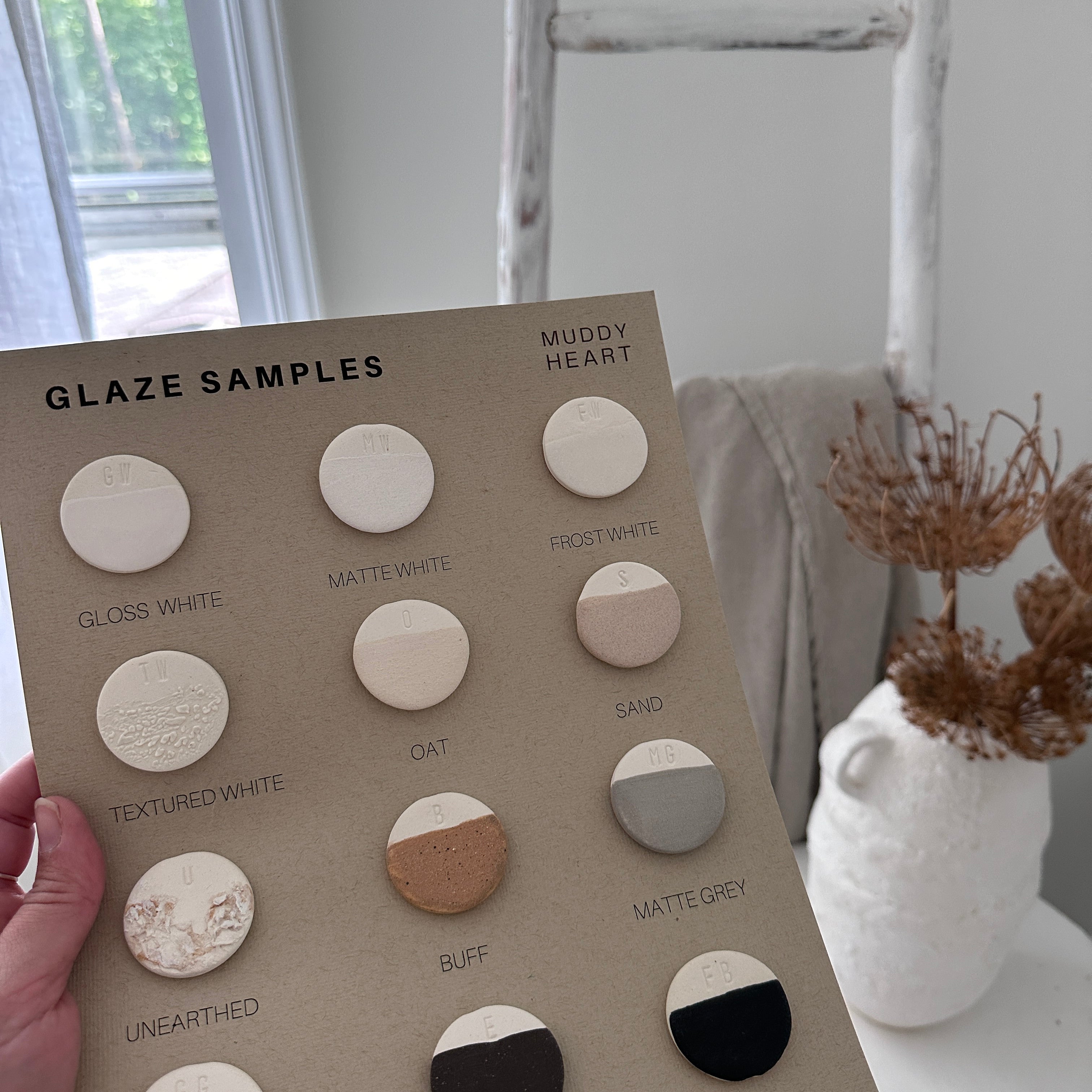 Set of ceramic color-chip tiles for comparing glaze shades and textures