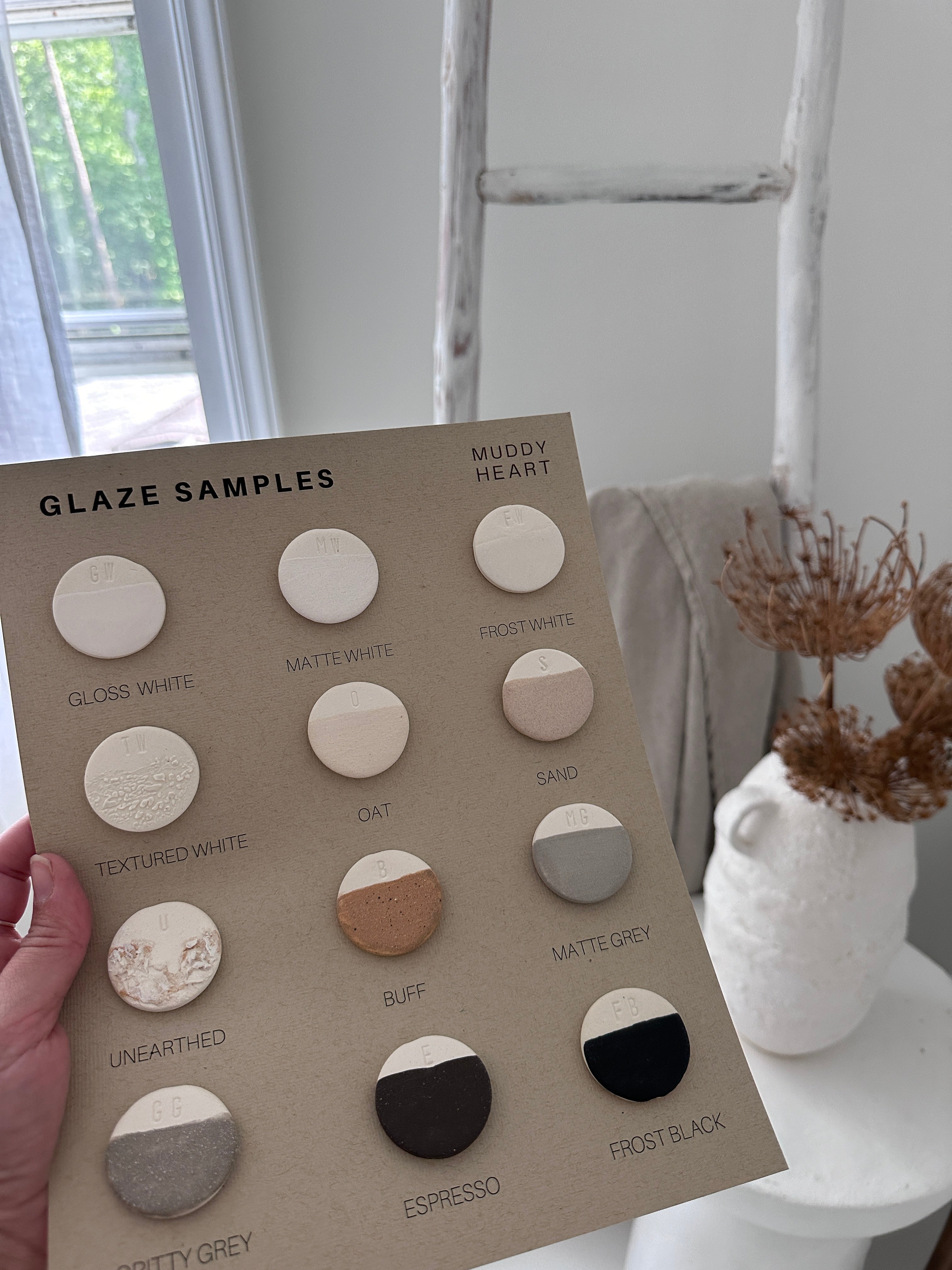 Set of ceramic color-chip tiles for comparing glaze shades and textures