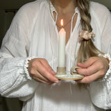Handmade primitive ceramic taper candle holder in a neutral glaze