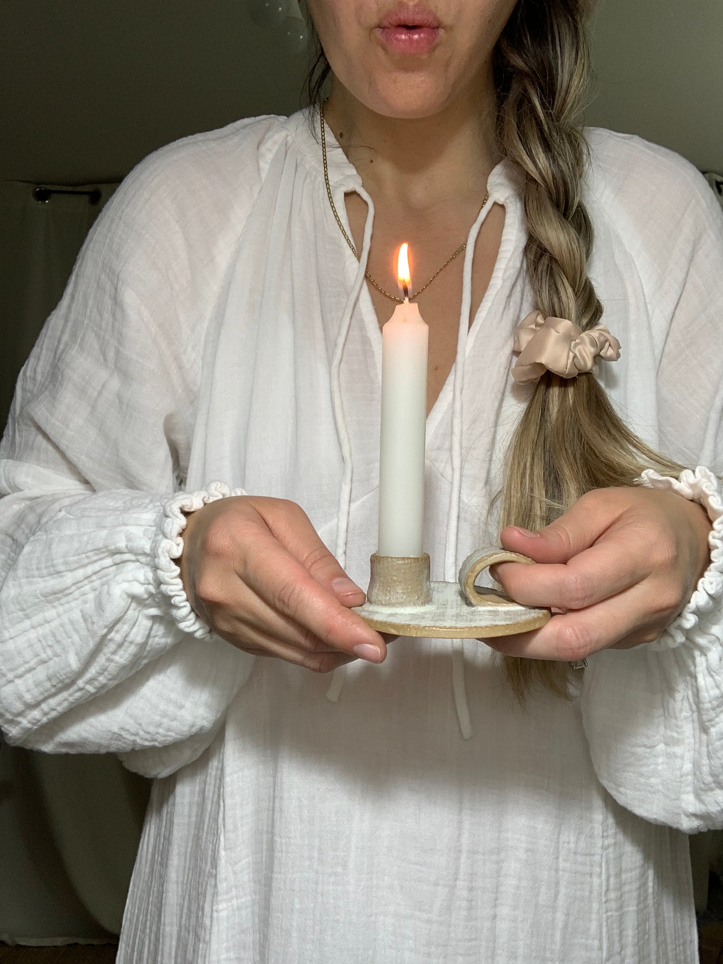 Handmade primitive ceramic taper candle holder in a neutral glaze