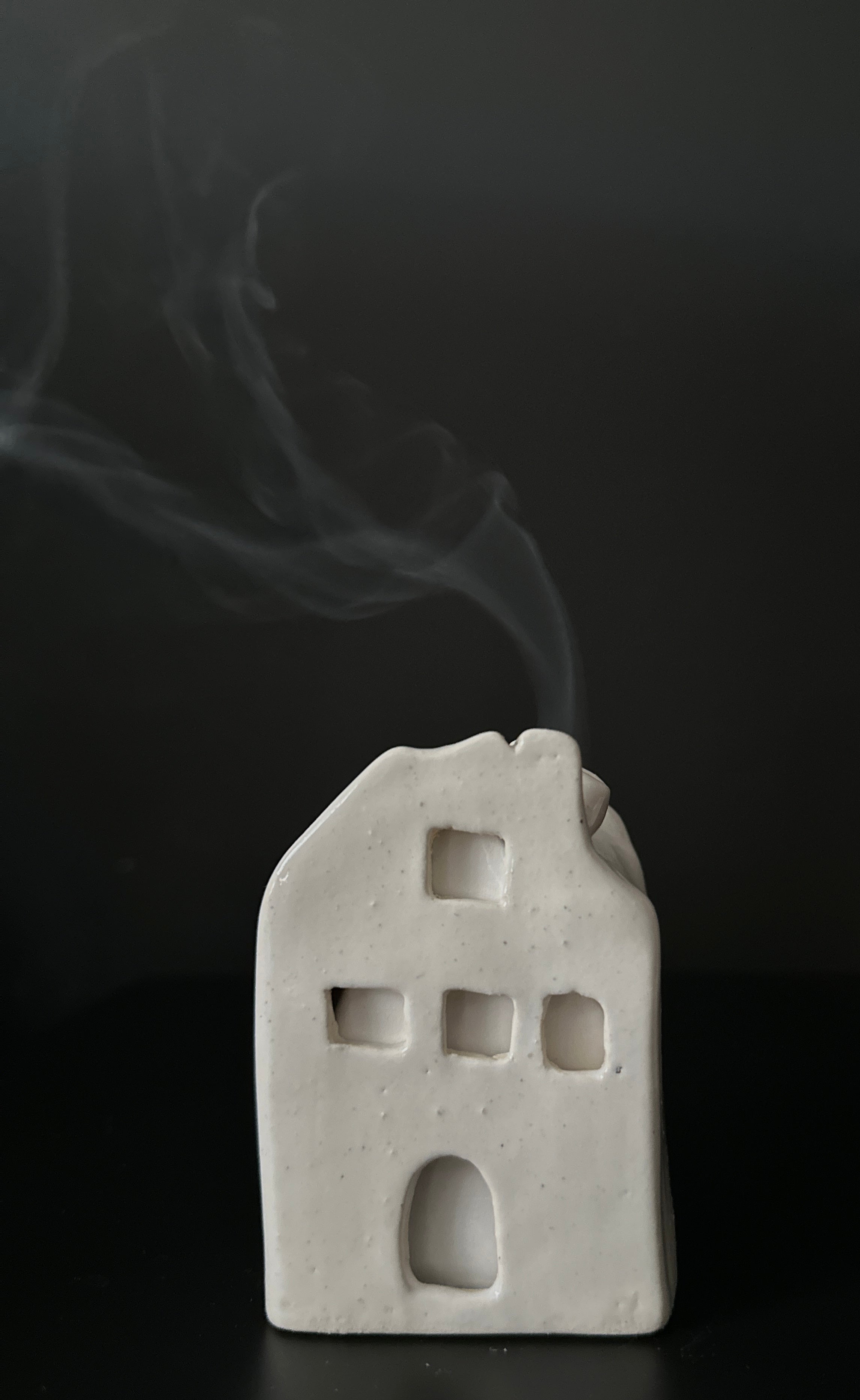 Cottage incense burner with chimney detail for a cozy tabletop ritual