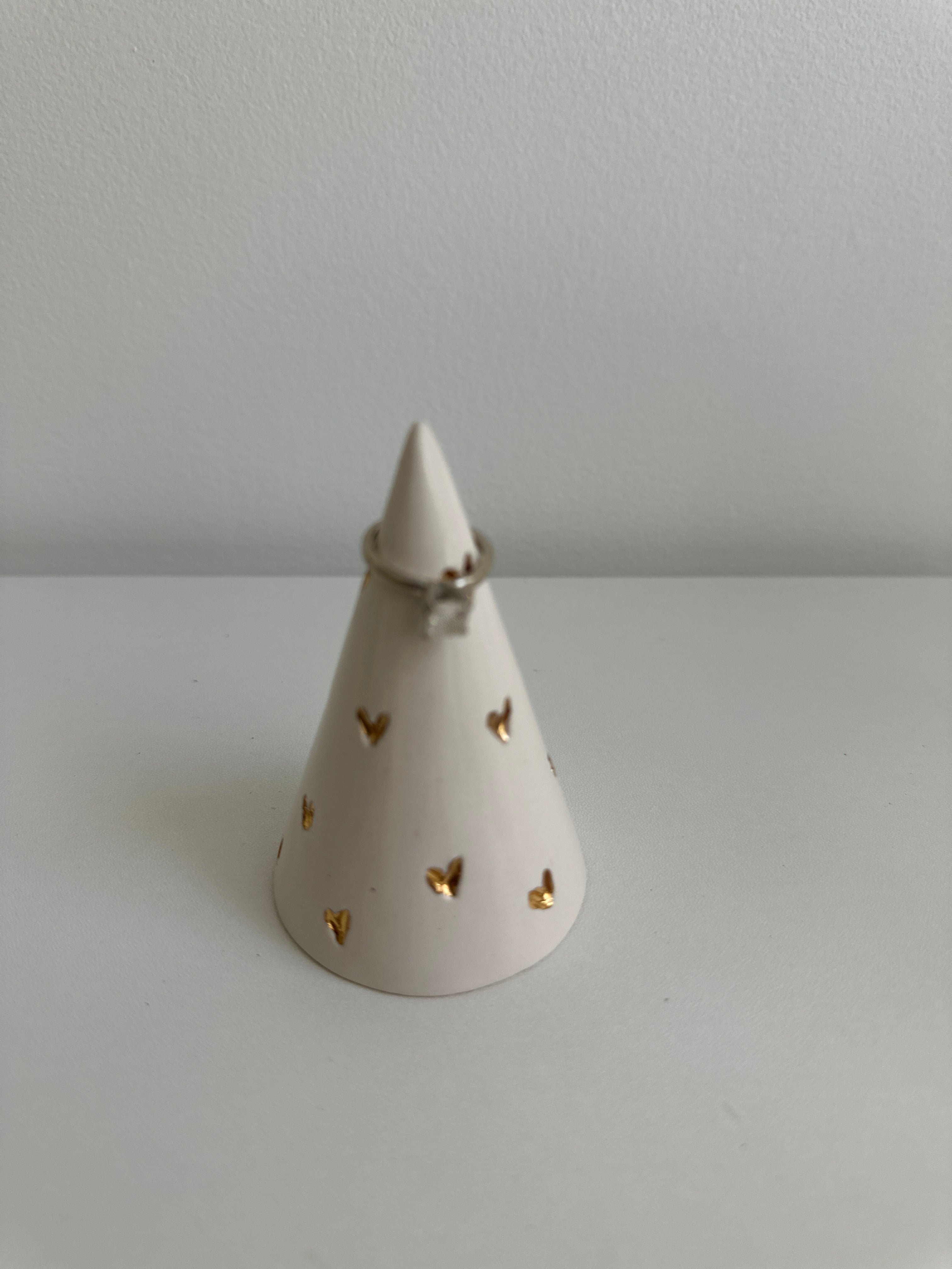 Handmade ceramic ring cone carved with little hearts and gilded in real 22-karat gold