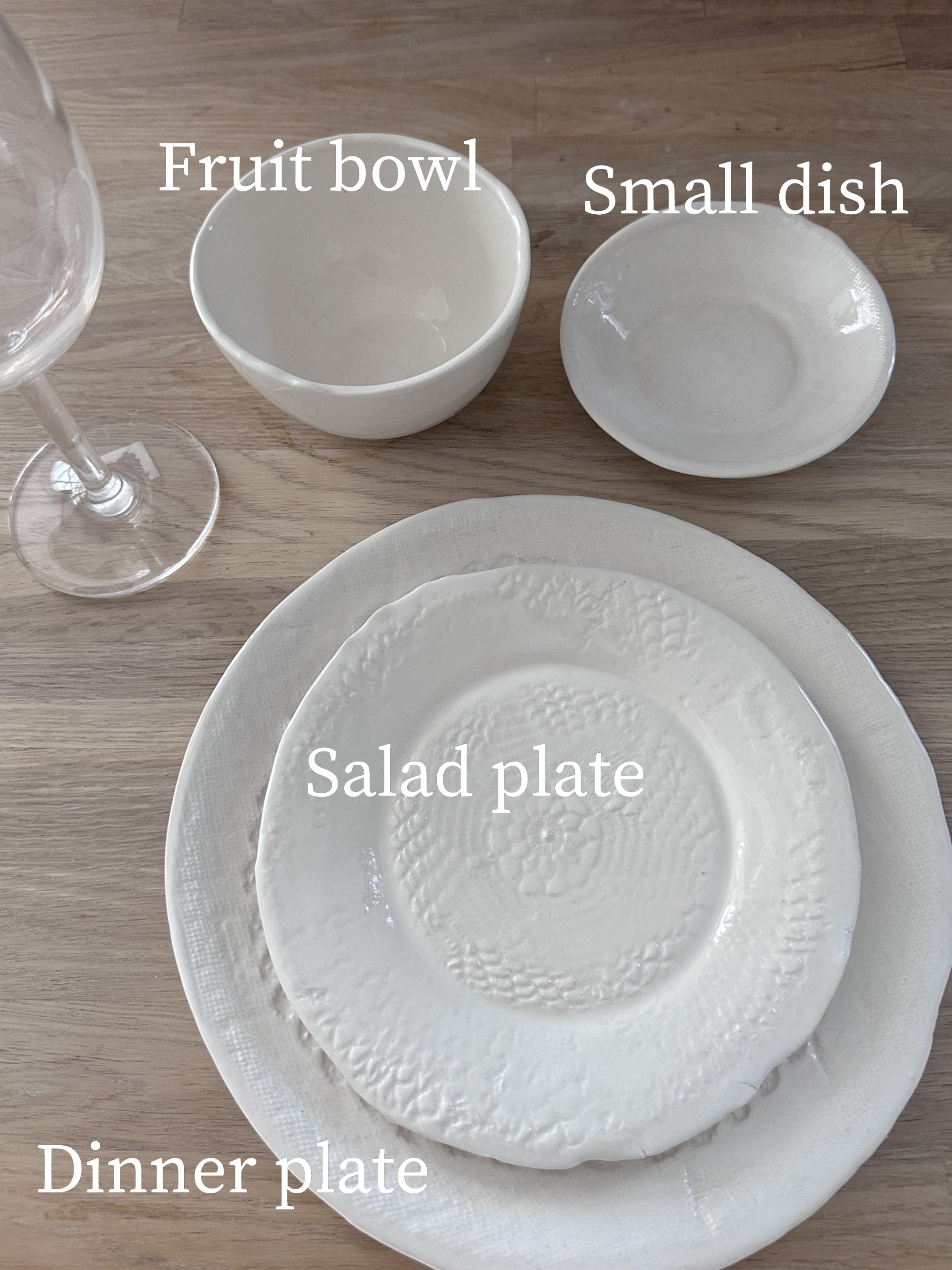 Smooth-textured ceramic salad plate with an organic raw edge
