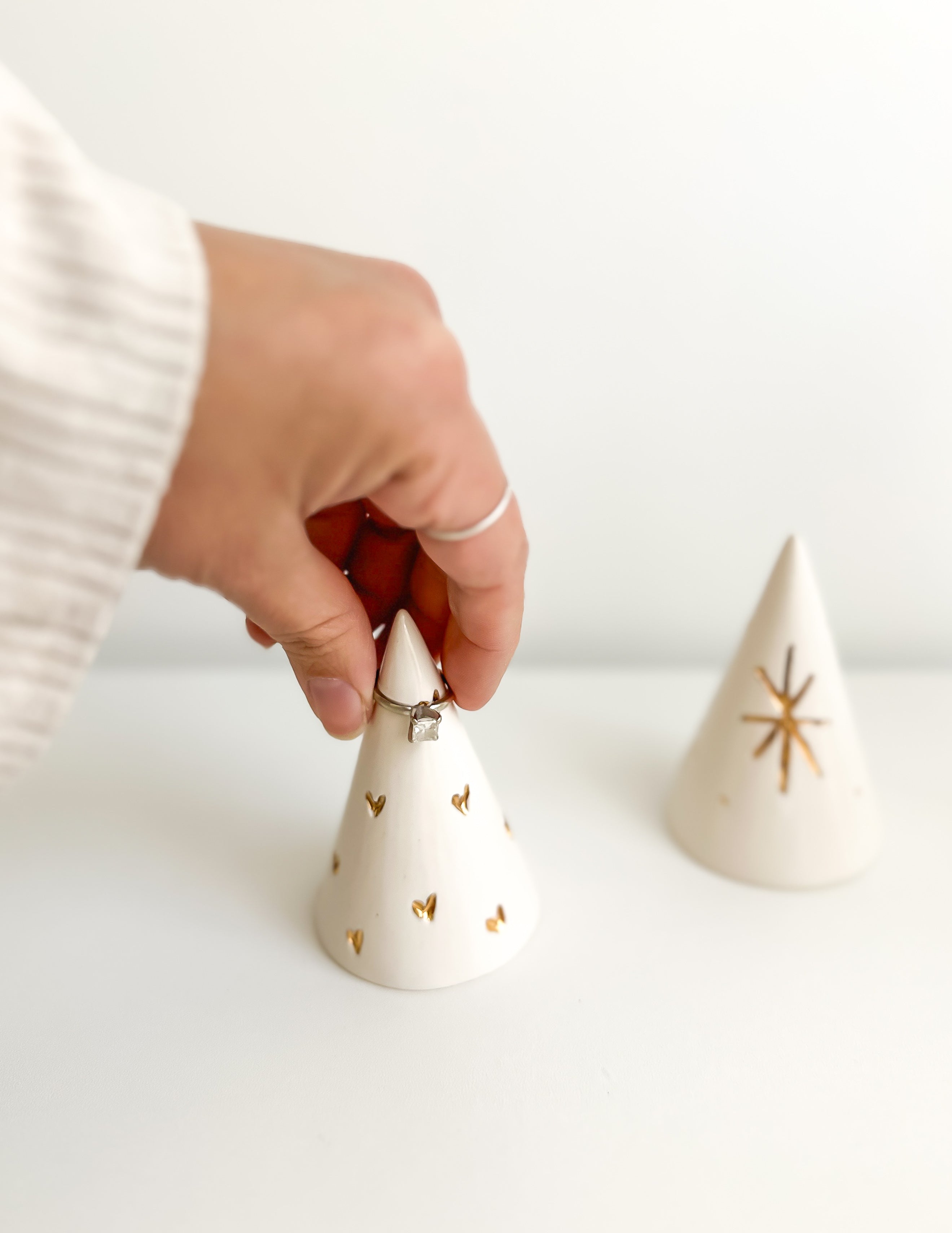 Handmade ceramic ring cone carved with little hearts and gilded in real 22-karat gold