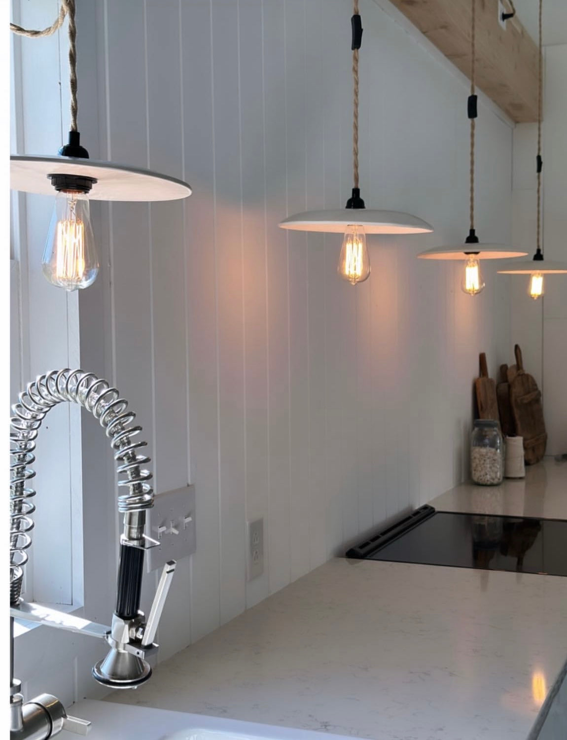 Handmade wide ceramic pendant light in a neutral stoneware finish