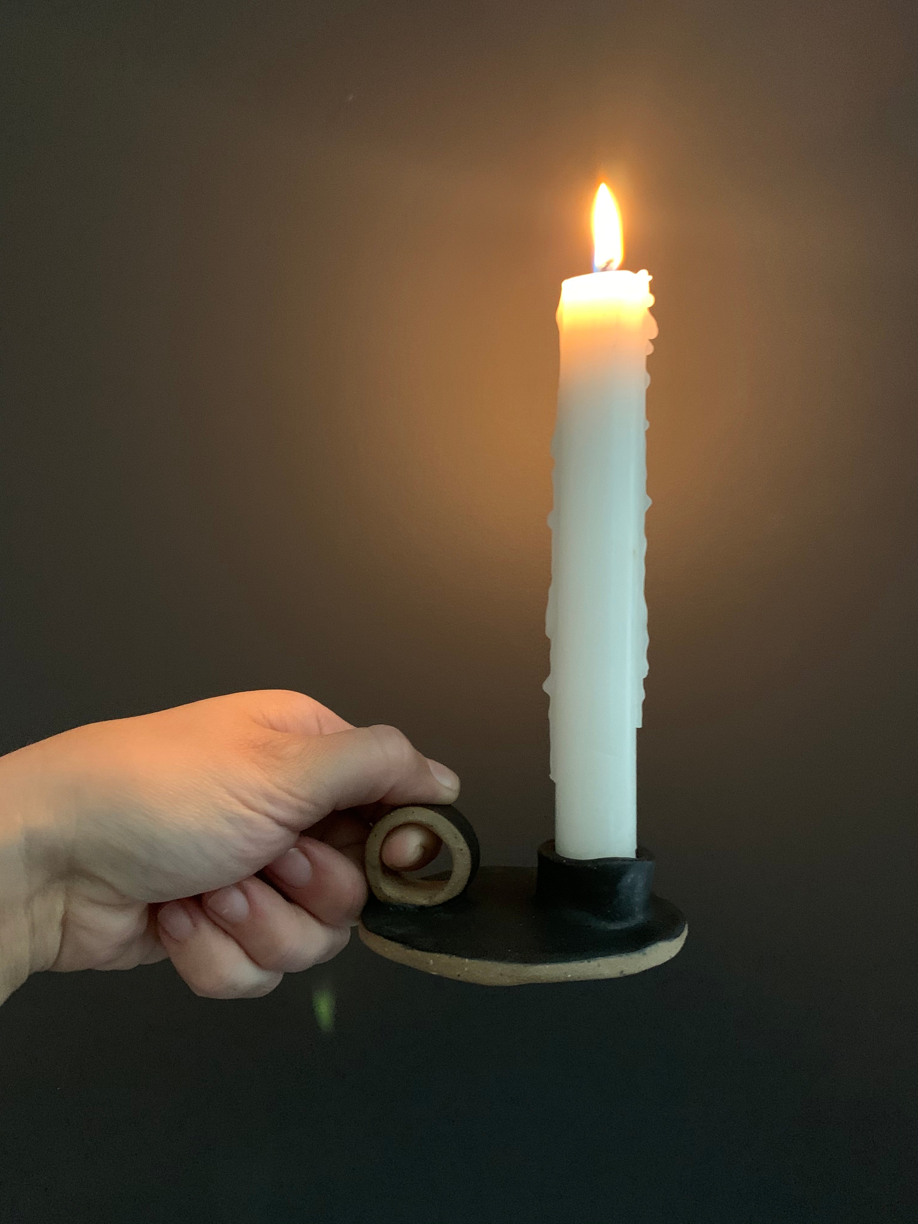 Handmade primitive ceramic taper candle holder in a neutral glaze