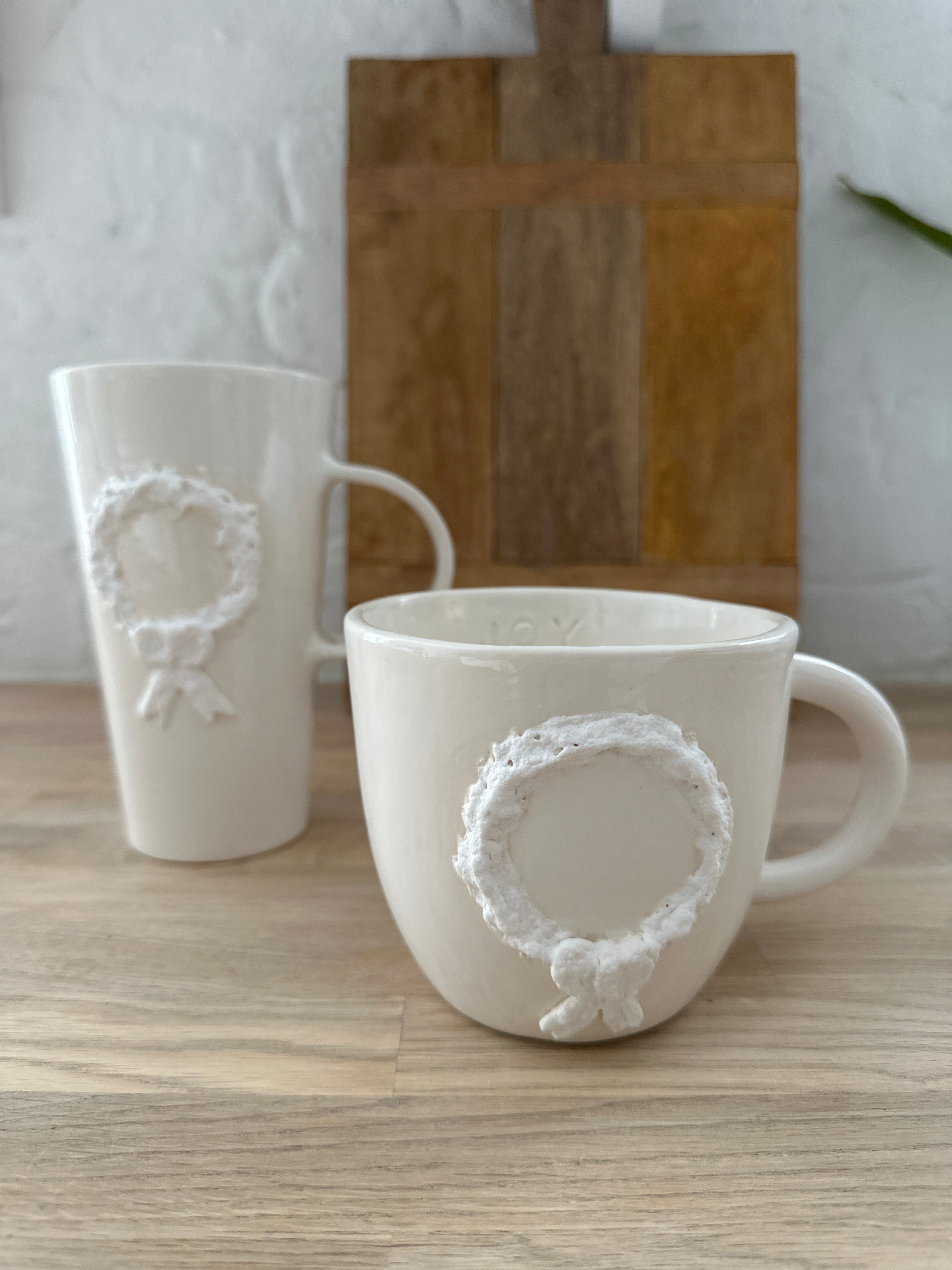 Handmade Christmas wreath mug styled for a cozy winter morning