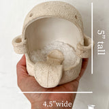 Handmade ceramic salt cellar with a wide opening for countertop salt