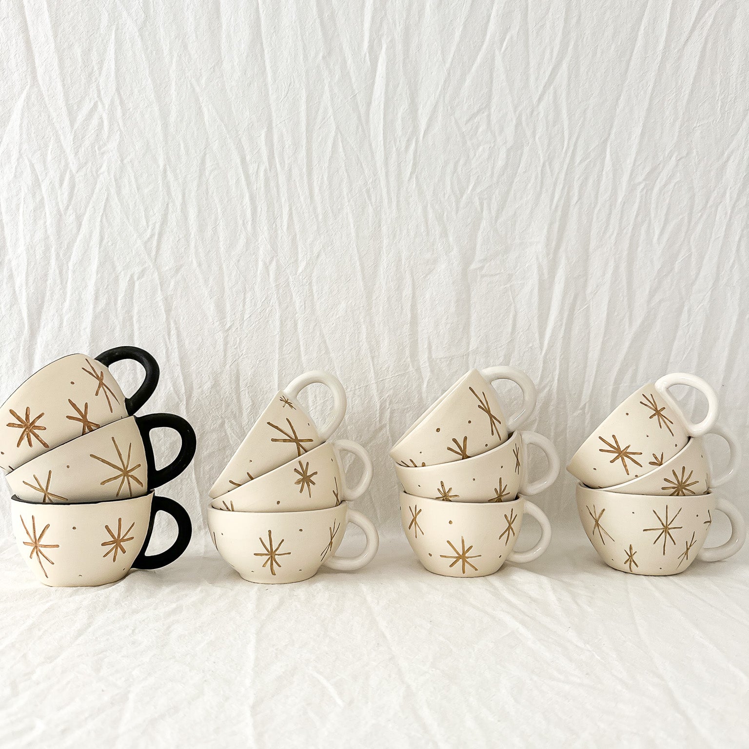Handmade ceramic mug with a pressed star texture, seconds sale