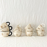 Handmade ceramic mug with a pressed star texture, seconds sale