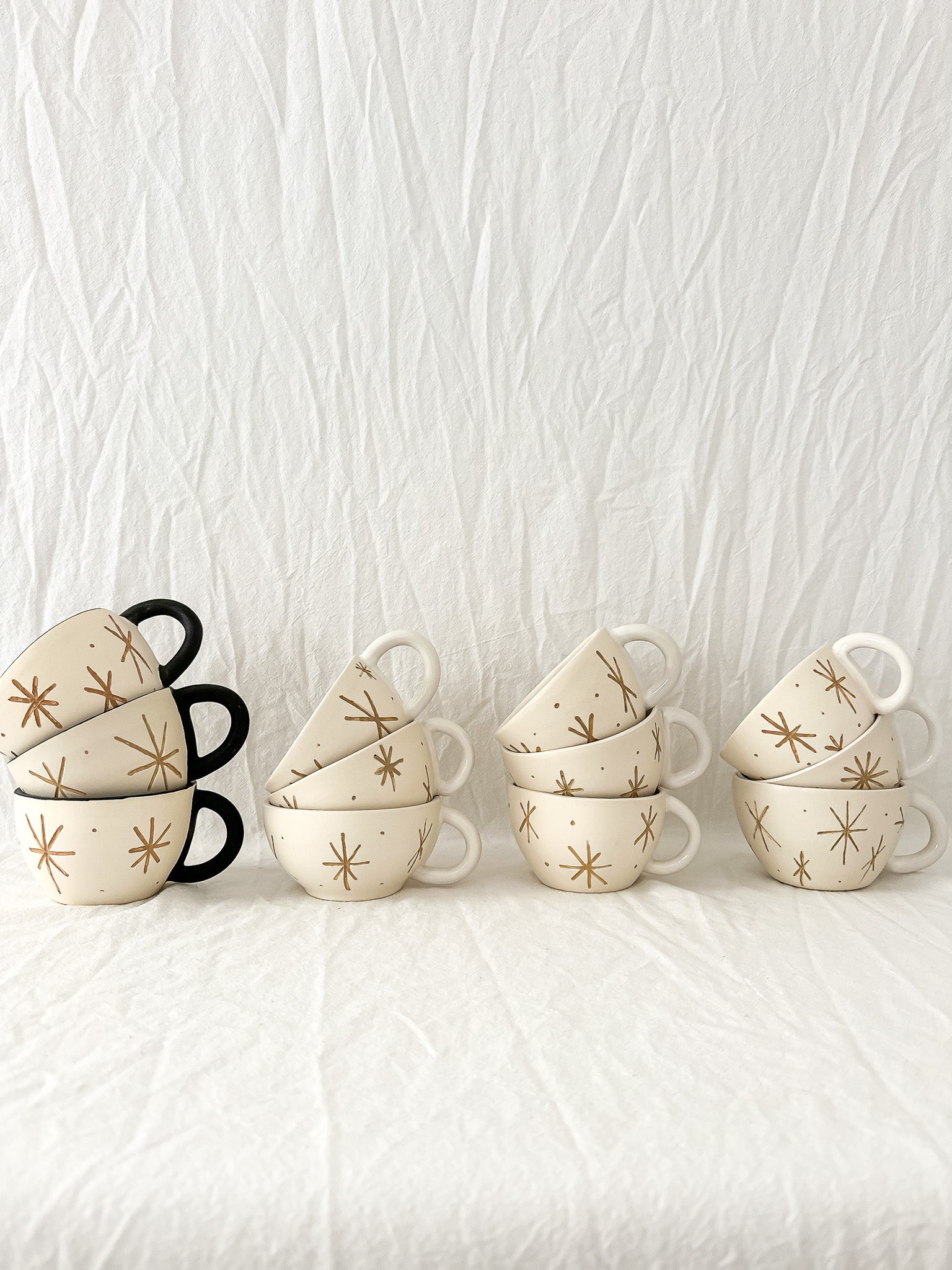 Handmade ceramic mug with a pressed star texture, seconds sale