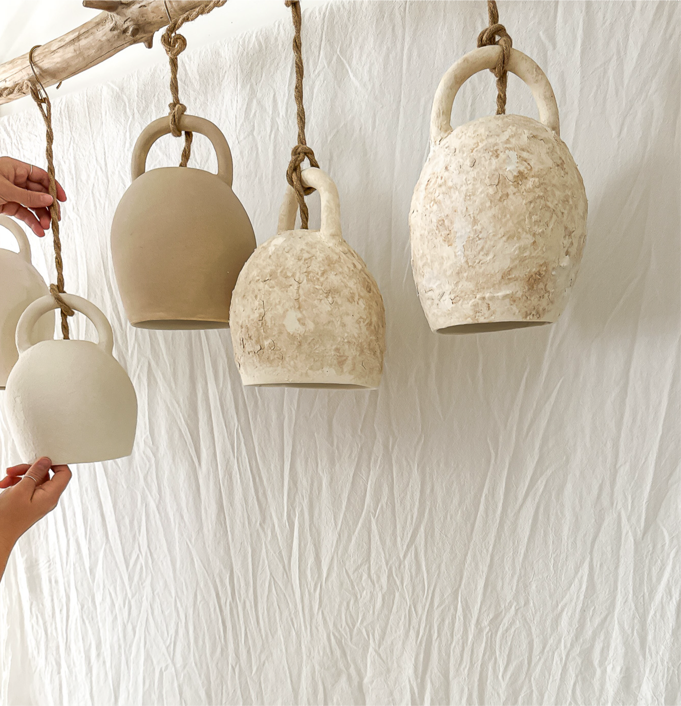 Detail of a handmade ceramic bell pendant lamp