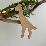 Personalized ceramic giraffe ornament with a custom name, a handmade baby keepsake ornament