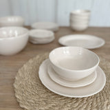 Handmade rustic-edge stoneware dinnerware in neutral tones
