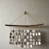 Eco-friendly wall art, driftwood and ceramic discs, modern coastal decoration