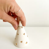 Handmade ceramic ring cone carved with little hearts and gilded in real 22-karat gold