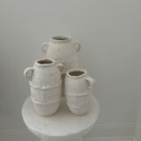 White Handmade ancient amphora style vessels  textured ceramic vases in neutral tones
