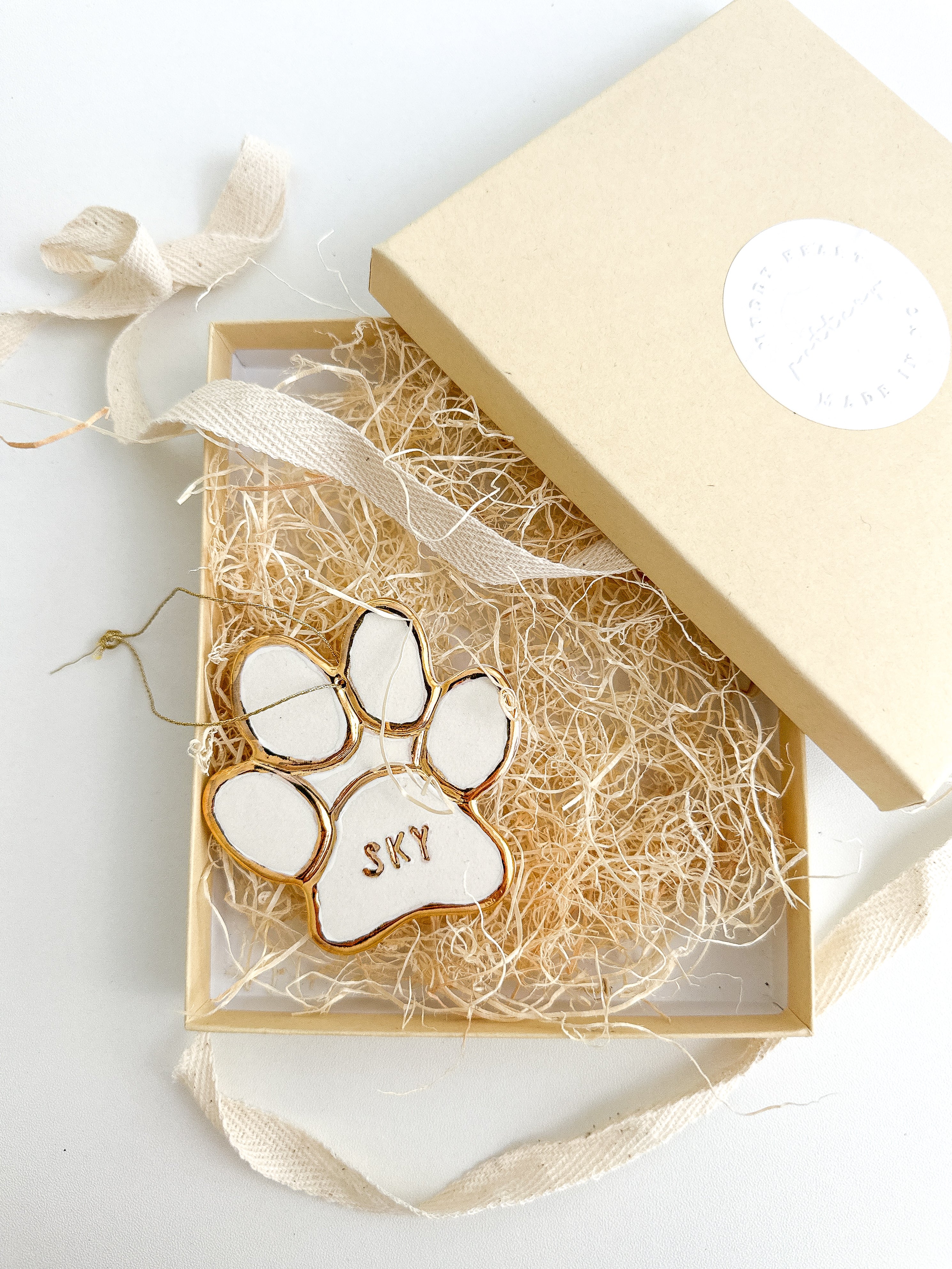 Handmade porcelain pet paw ornament with 22K gold luster by Muddy Heart