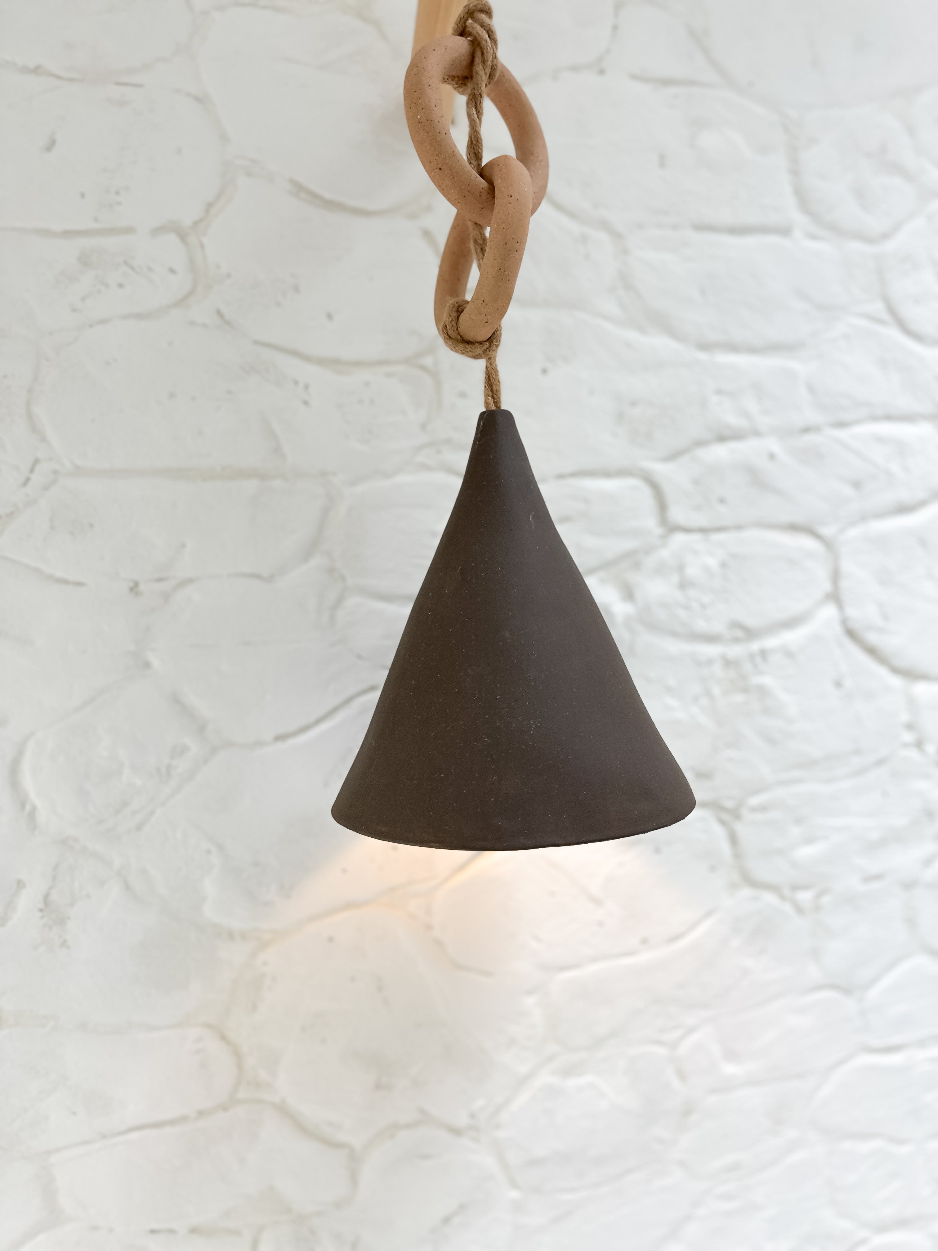 Handmade loops pendant light styled over a table